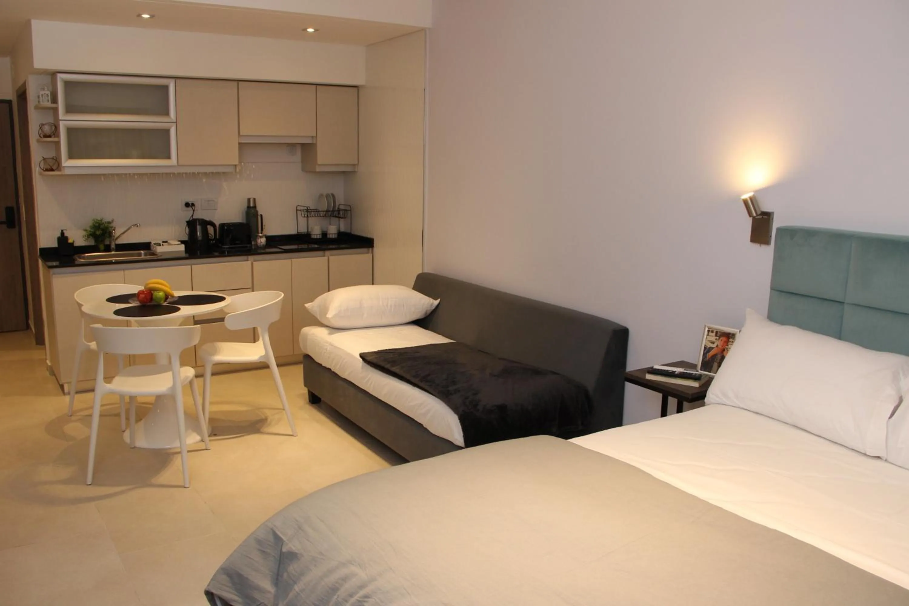 Photo of the whole room, Bed in In House BA - College