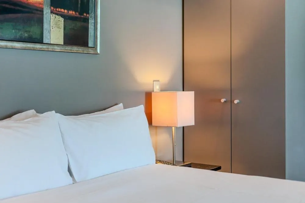 Bedroom, Bed in 70 Tory Apartment