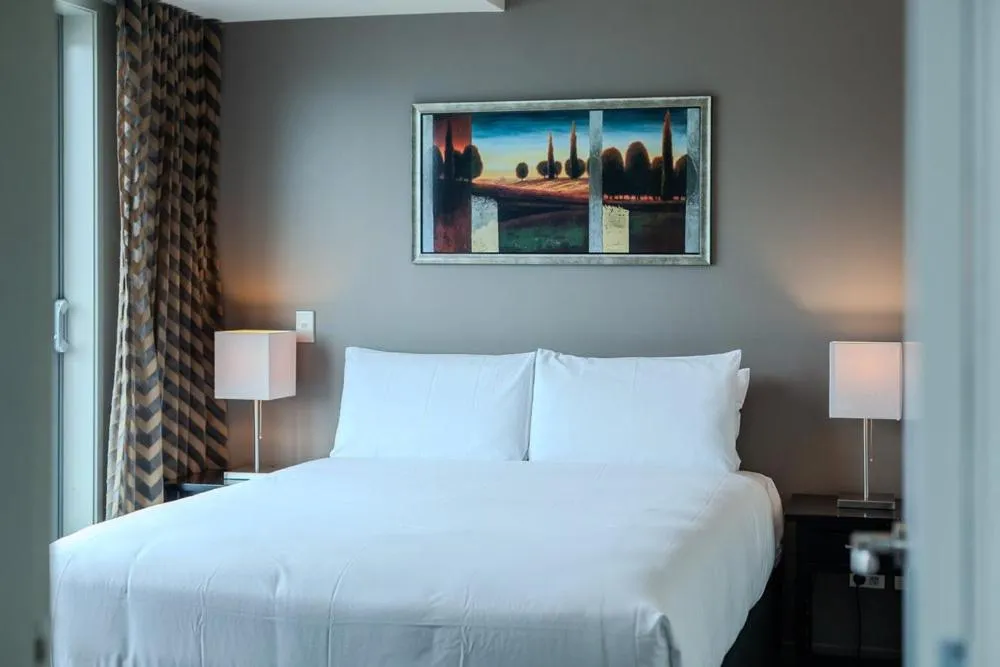 Bedroom, Bed in 70 Tory Apartment