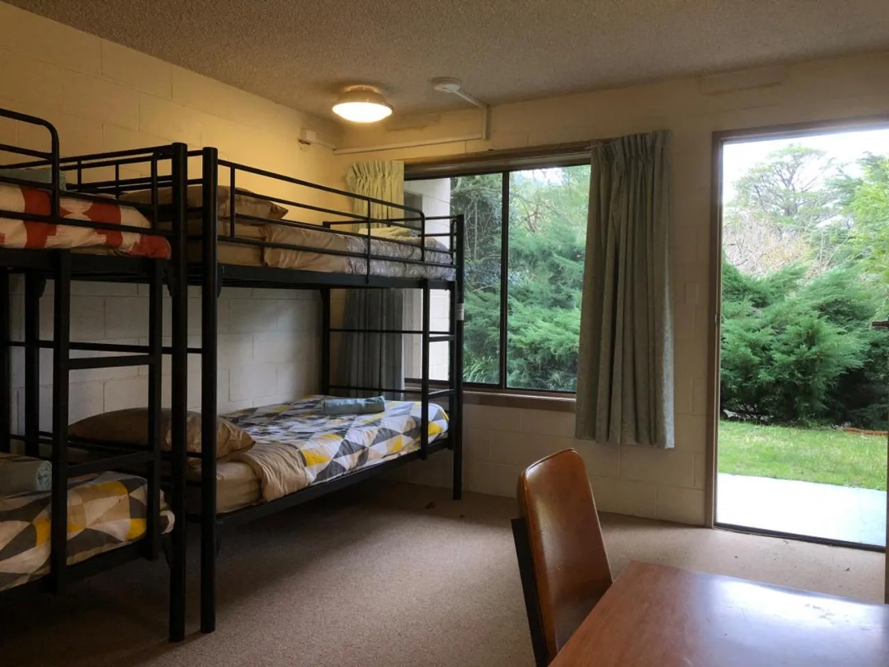 Bed in Green Gables Motel in Warburton