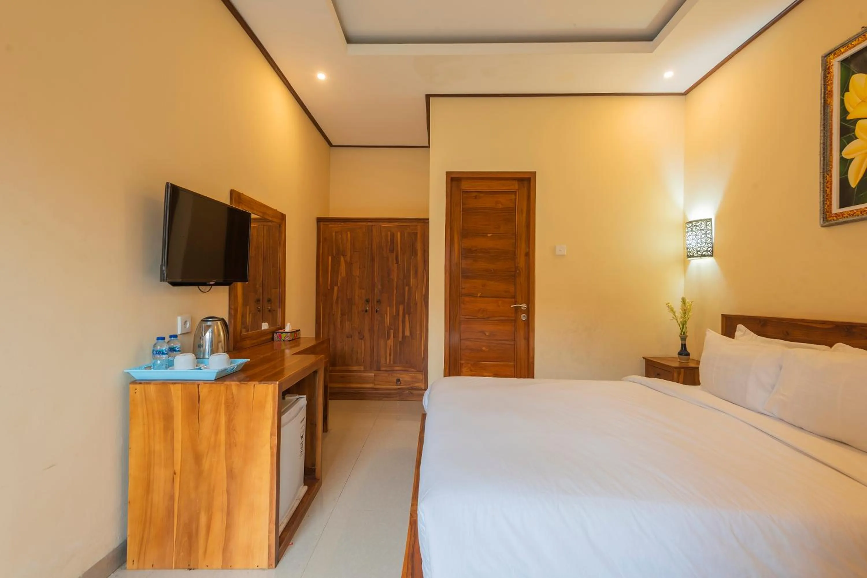 Bed in Liliy Guest House Legian