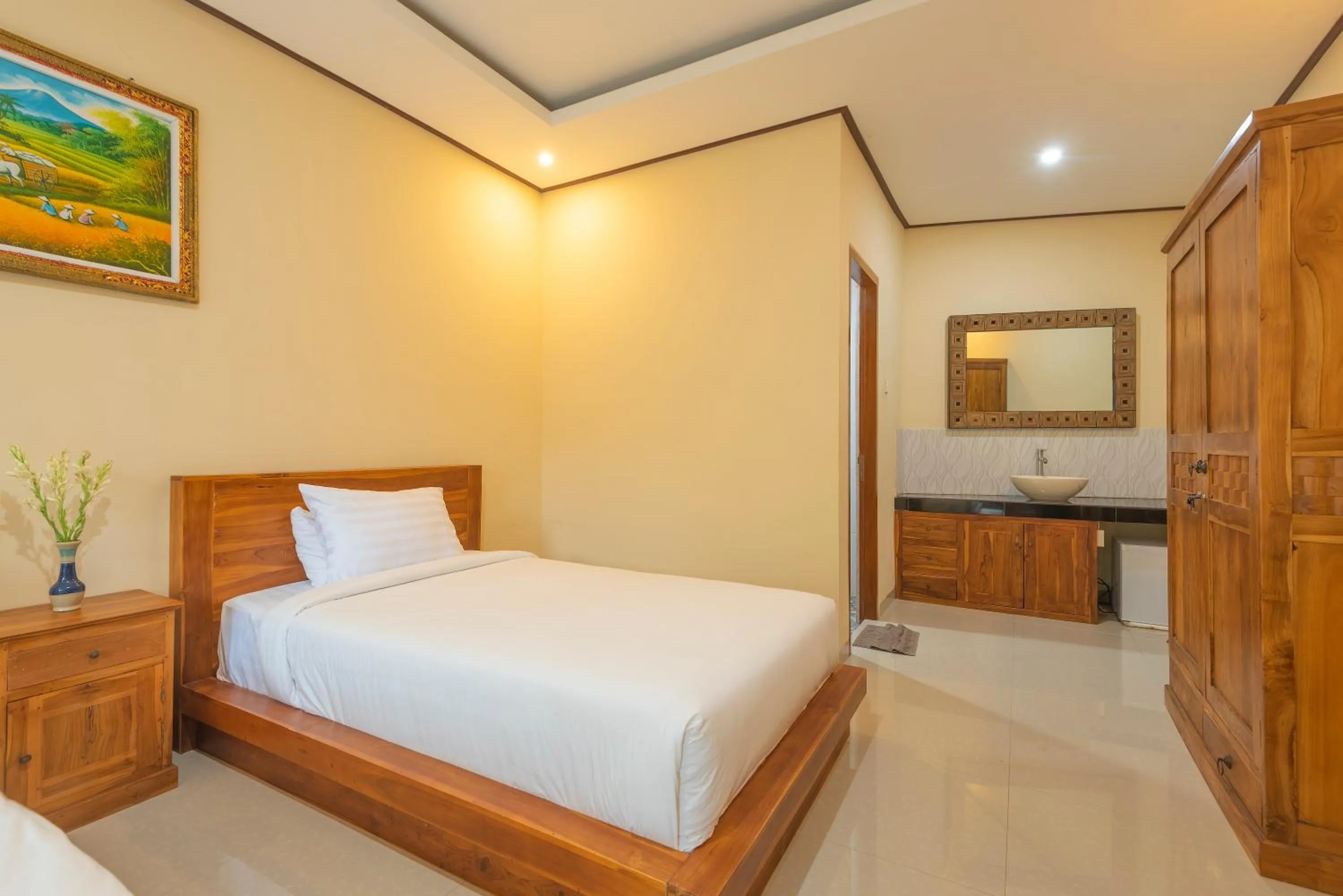 Bed in Liliy Guest House Legian