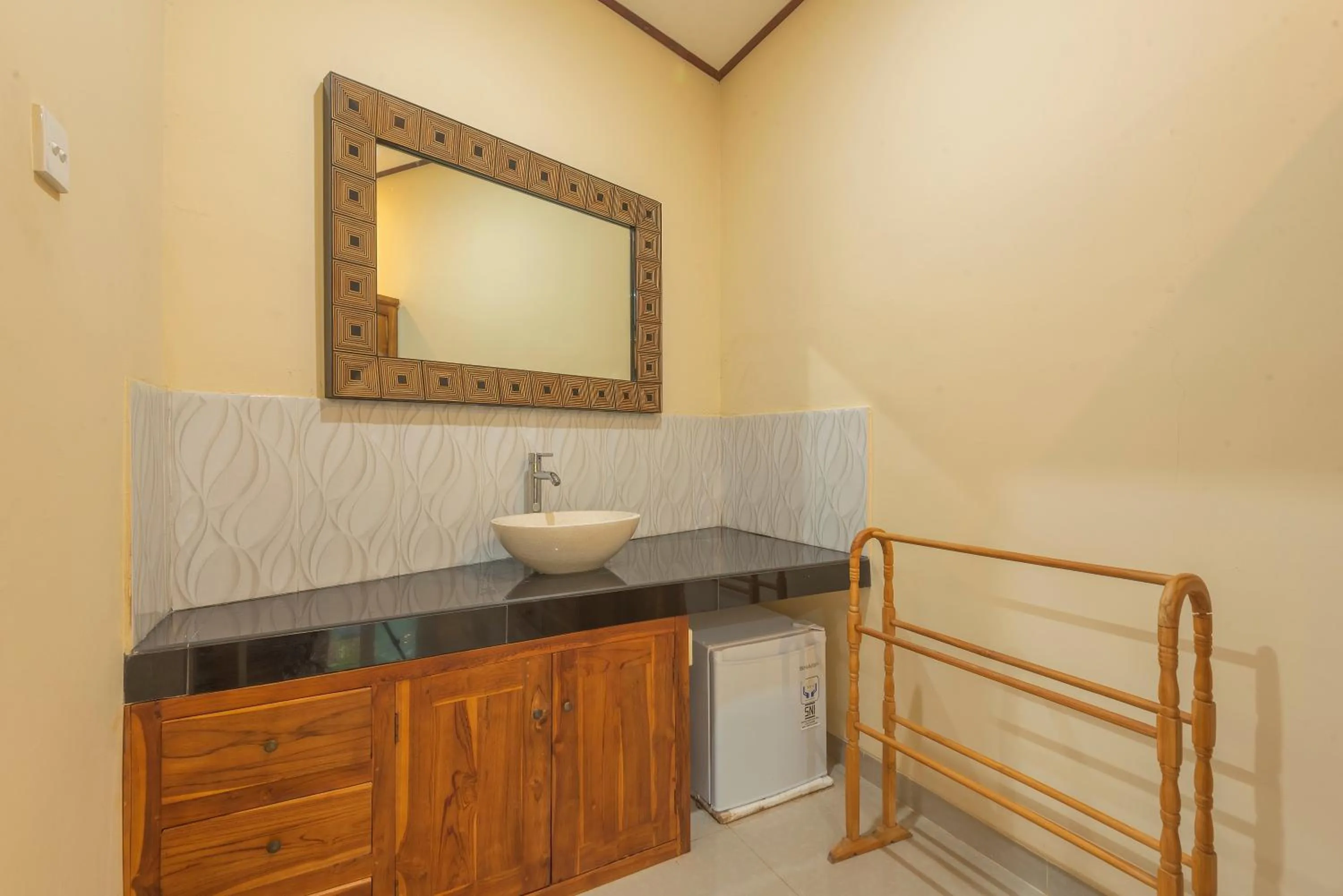 Bathroom in Liliy Guest House Legian