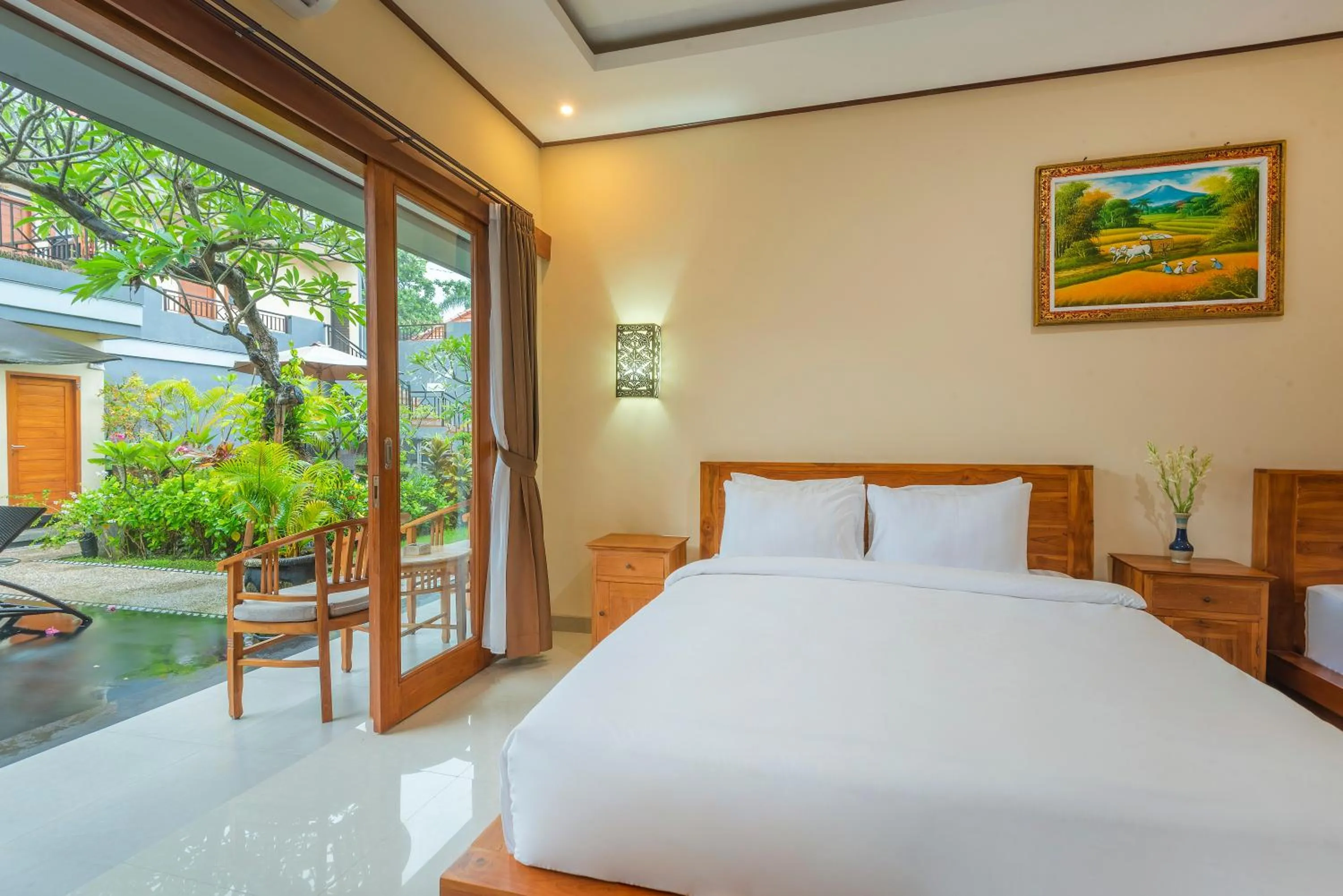Bed in Liliy Guest House Legian