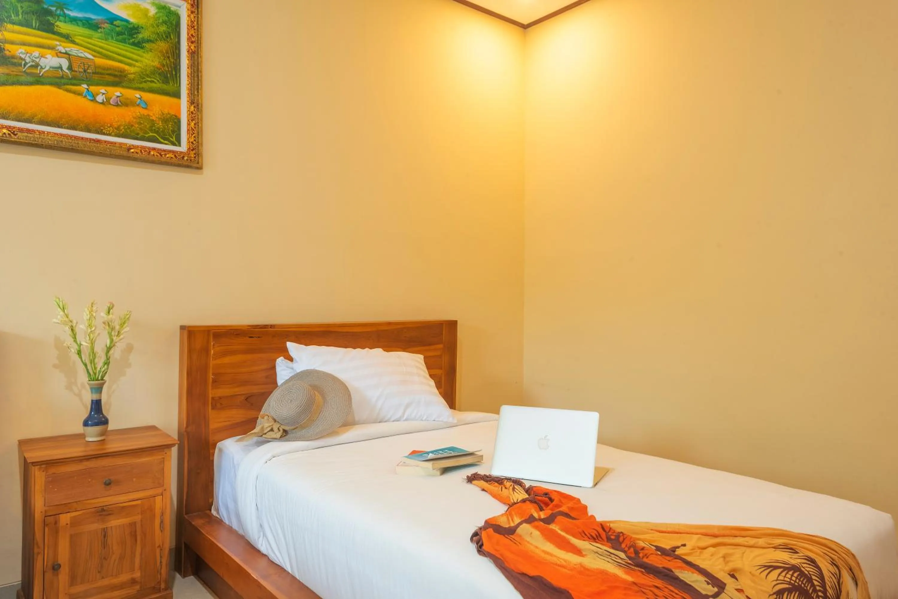Bed in Liliy Guest House Legian