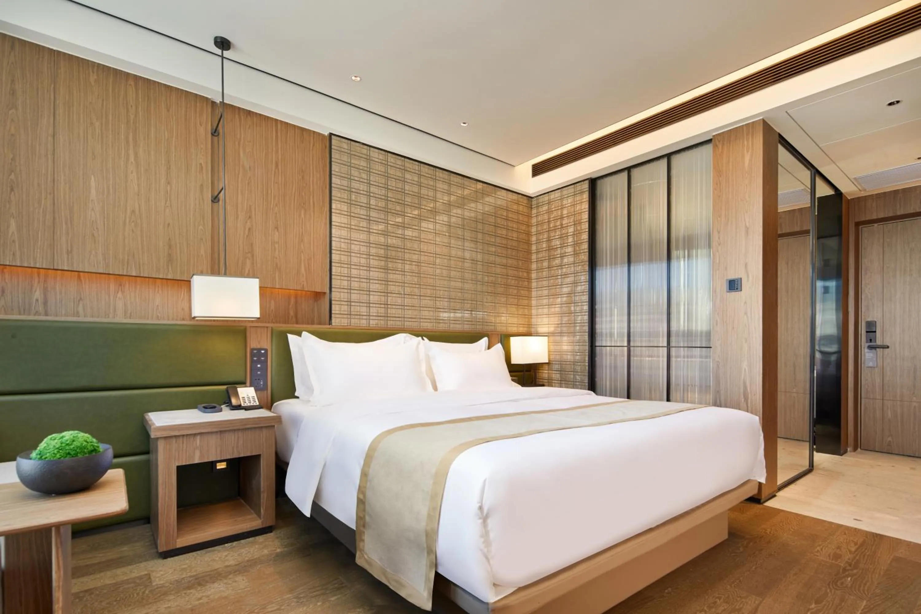 Bed in Dongguan Tangxia Huaman Hotel