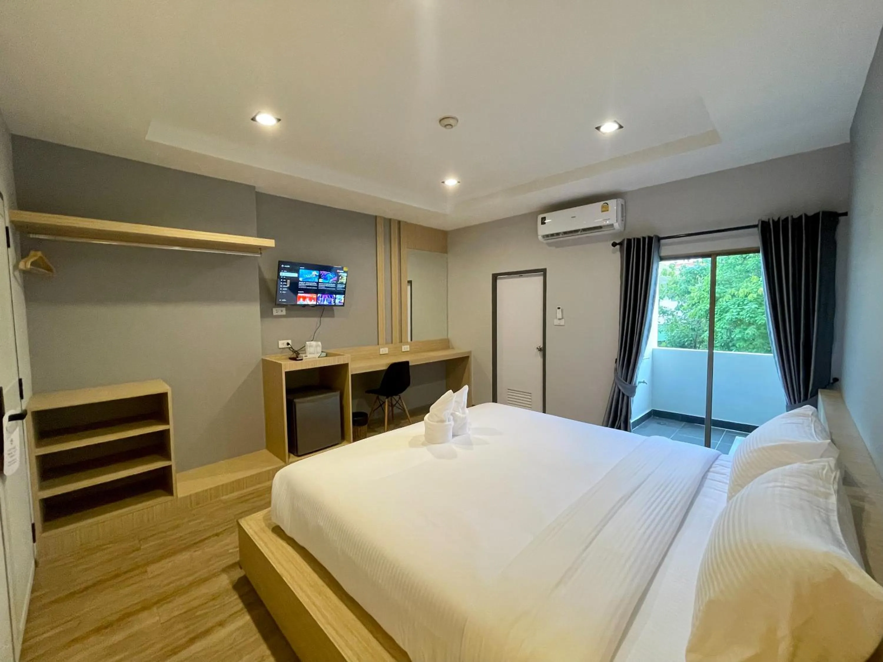 Bed in Klaang Muang Hotel (โรงแรมกลางเมือง)