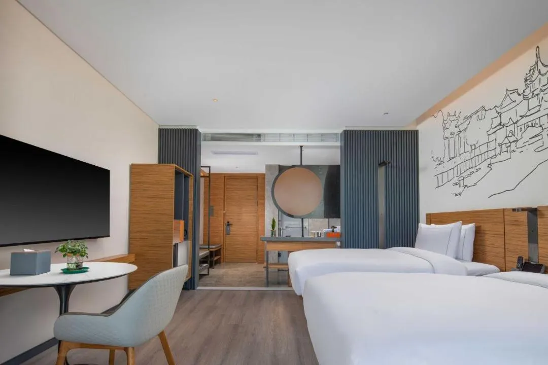 Bed in UrCove by HYATT Nanjing South Railway Station