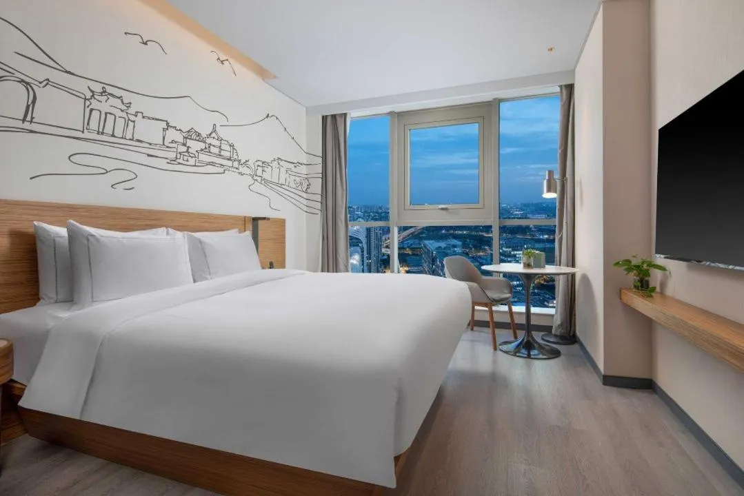 Bed in UrCove by HYATT Nanjing South Railway Station
