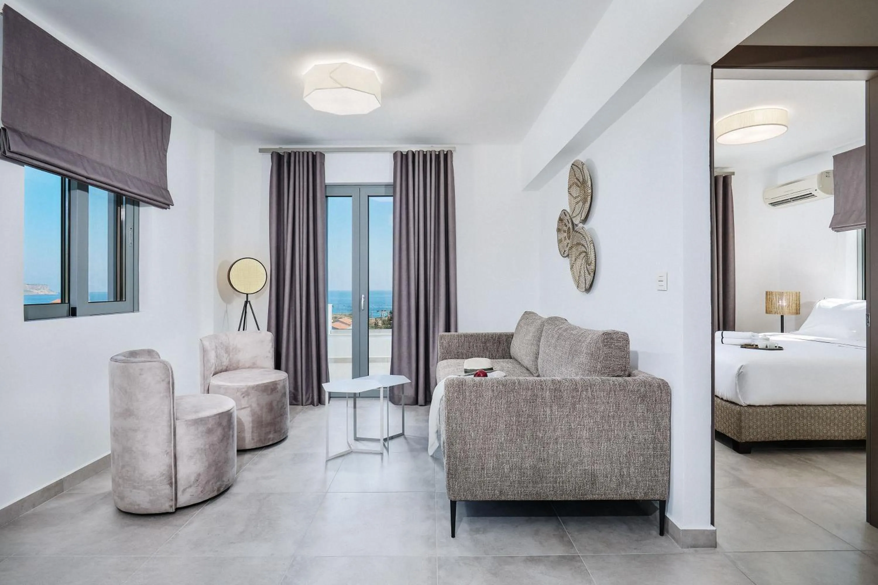 Living room, Bed in Quattro Suites