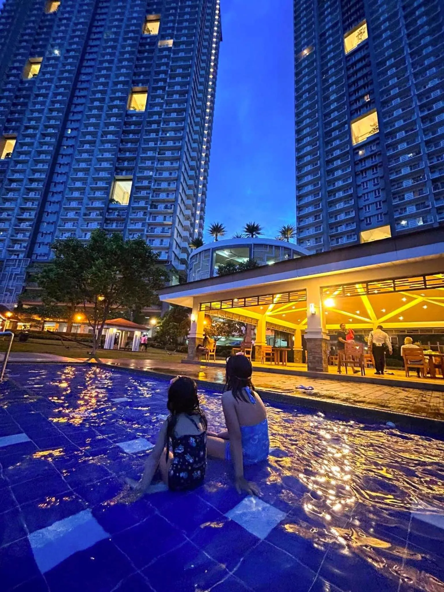 Swimming pool in Zinnia Towers 1BR Condo with PS4 Karaoke Netflix & Swimming Pool