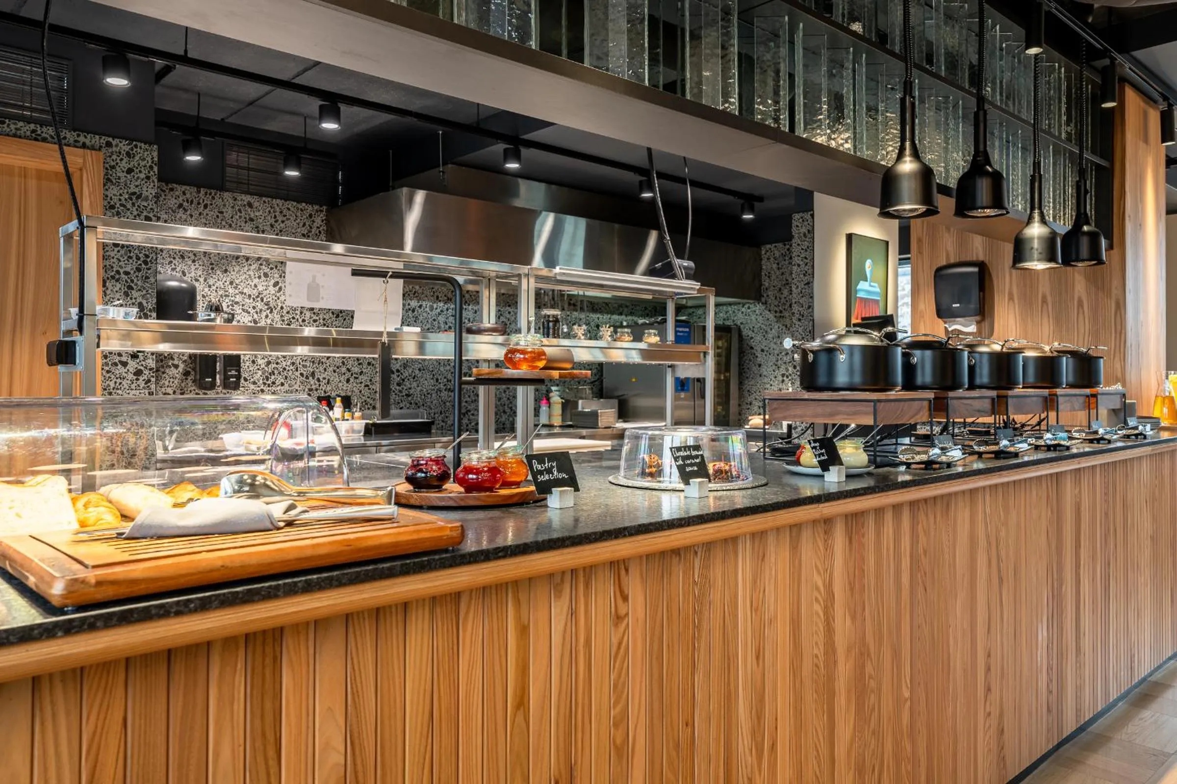 Kitchen or kitchenette in Aston Hotel Riga