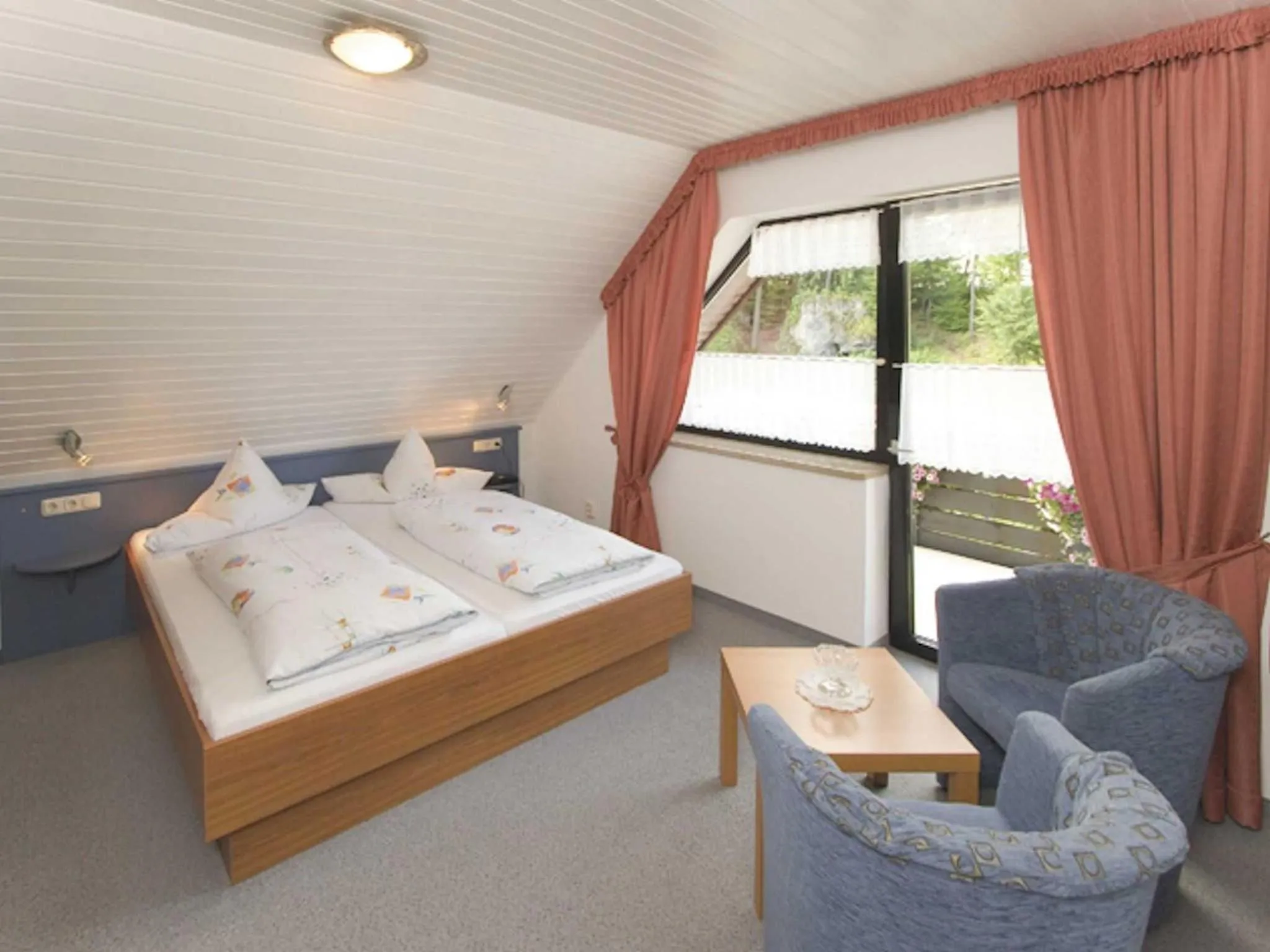 Bed in Gästehaus Brütting