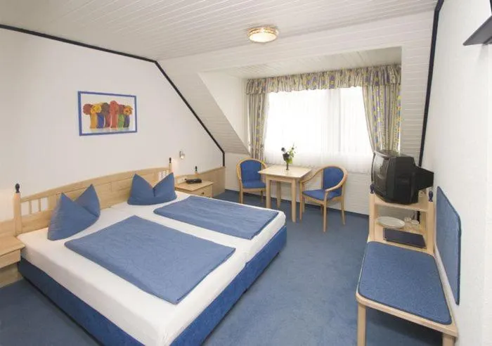 Bed in Gästehaus Brütting