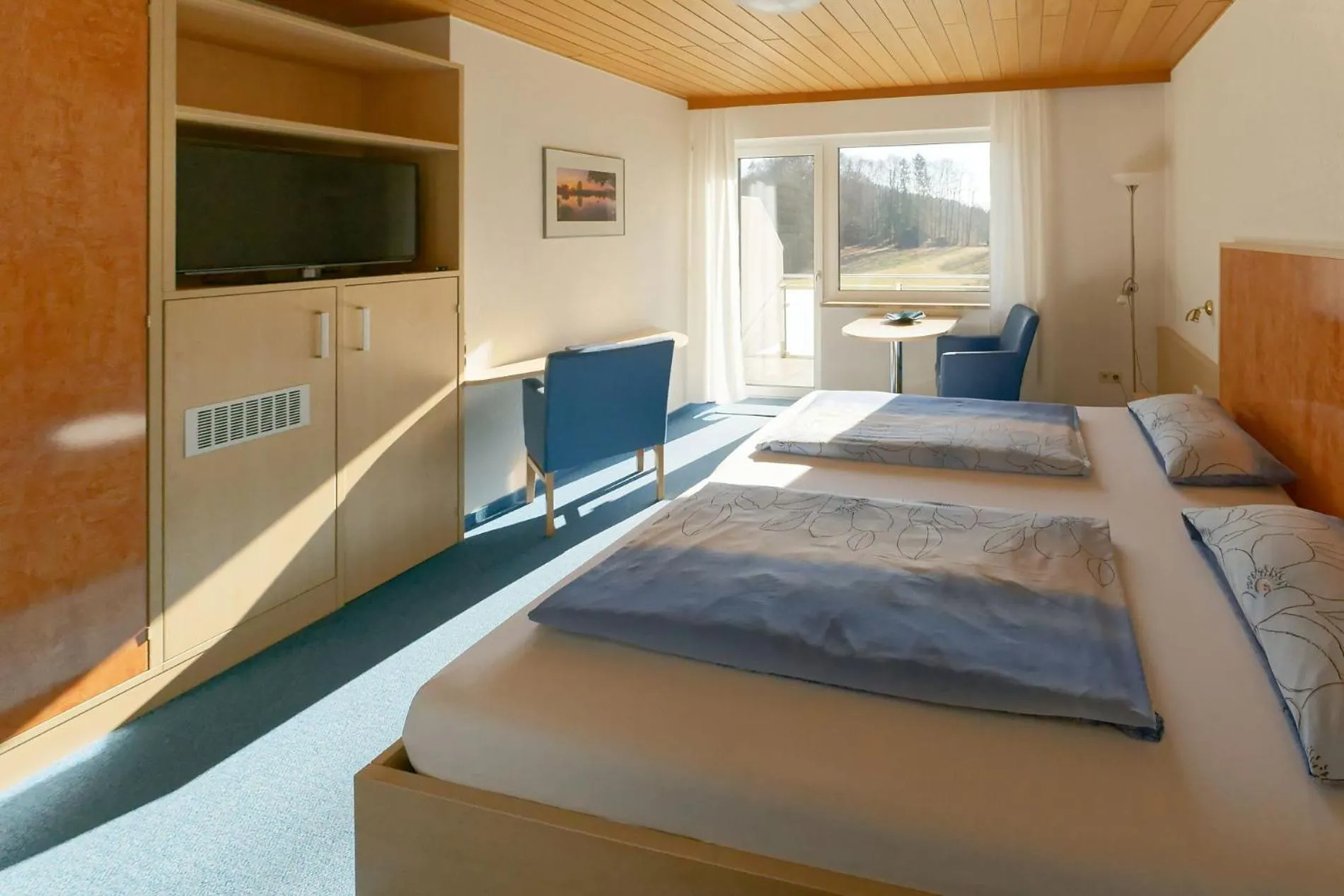 Bed in Gästehaus Brütting