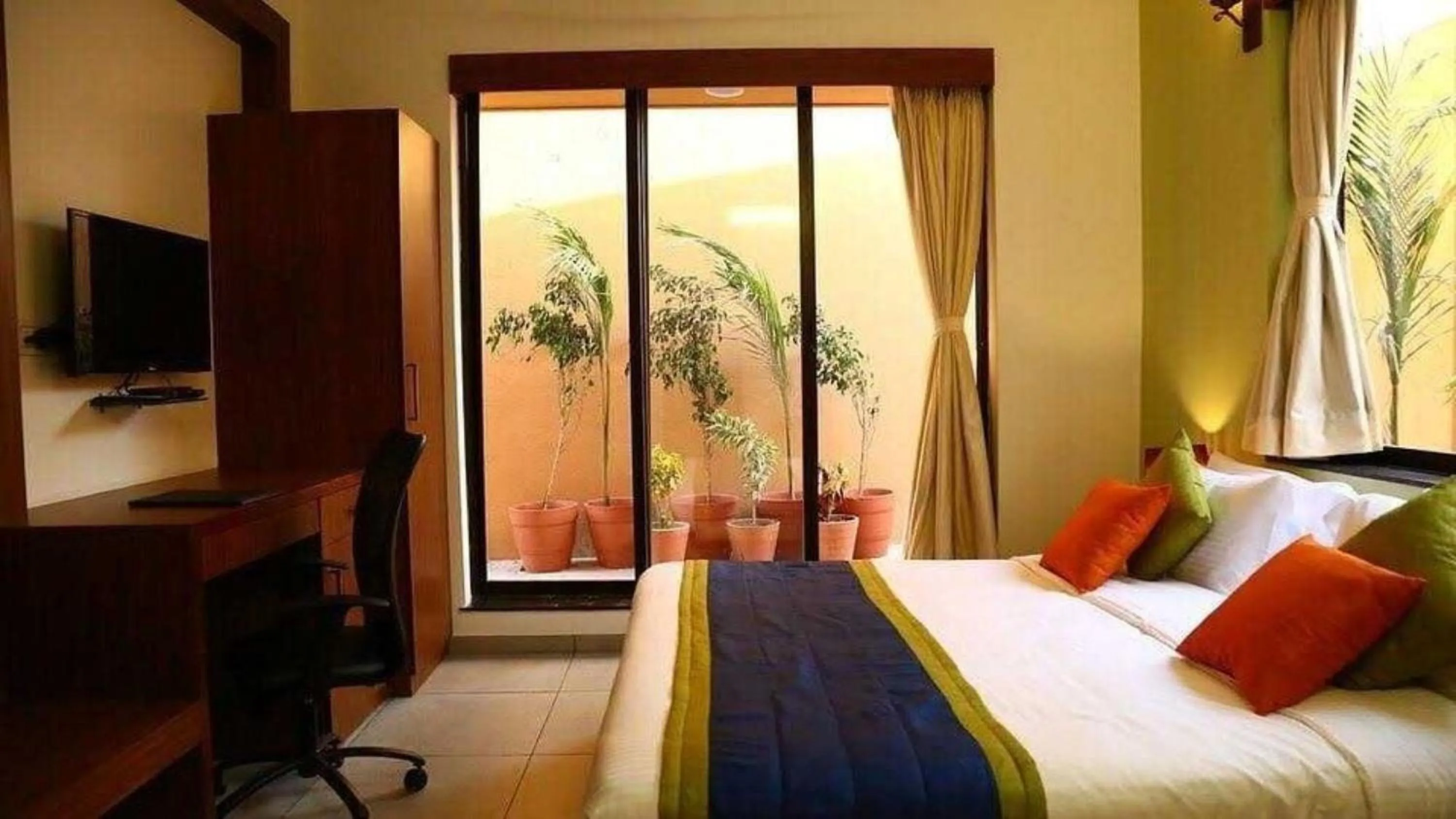 Bed in Palette by CheckIn The Royal Castle Resort Rajkot