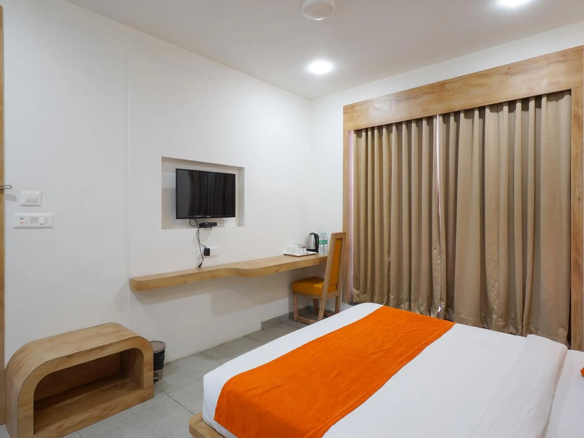 Bedroom, Bed in Palette by CheckIn The Royal Castle Resort Rajkot