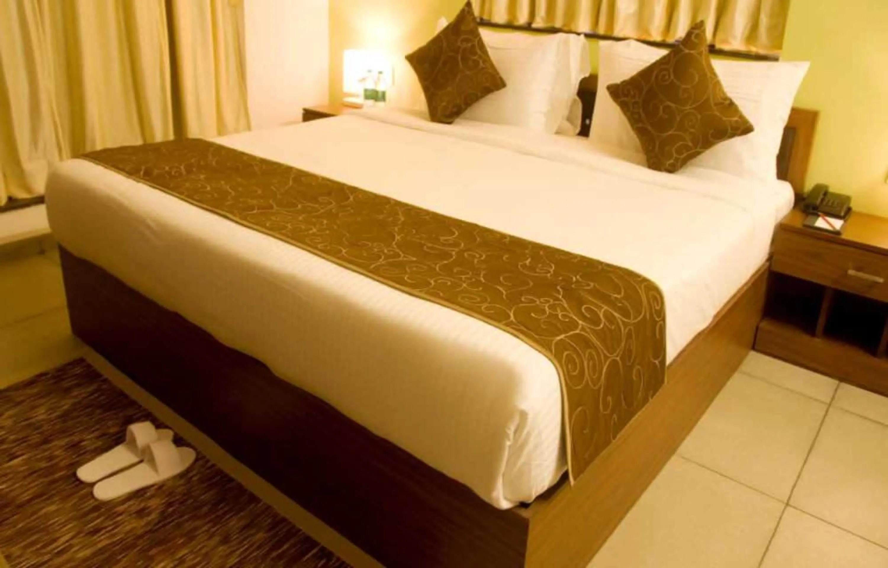 Bed in Palette by CheckIn The Royal Castle Resort Rajkot