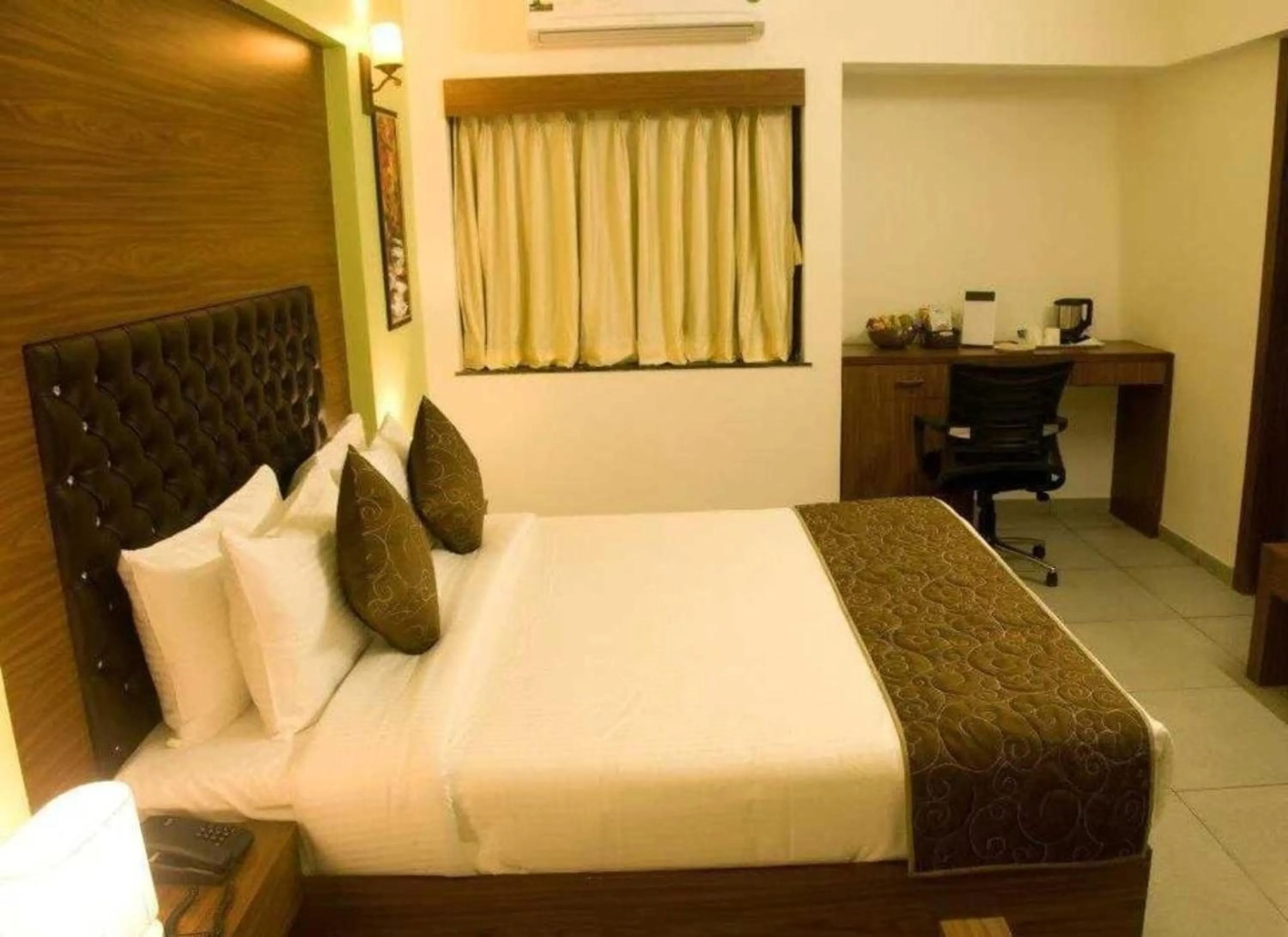 Bed in Palette by CheckIn The Royal Castle Resort Rajkot