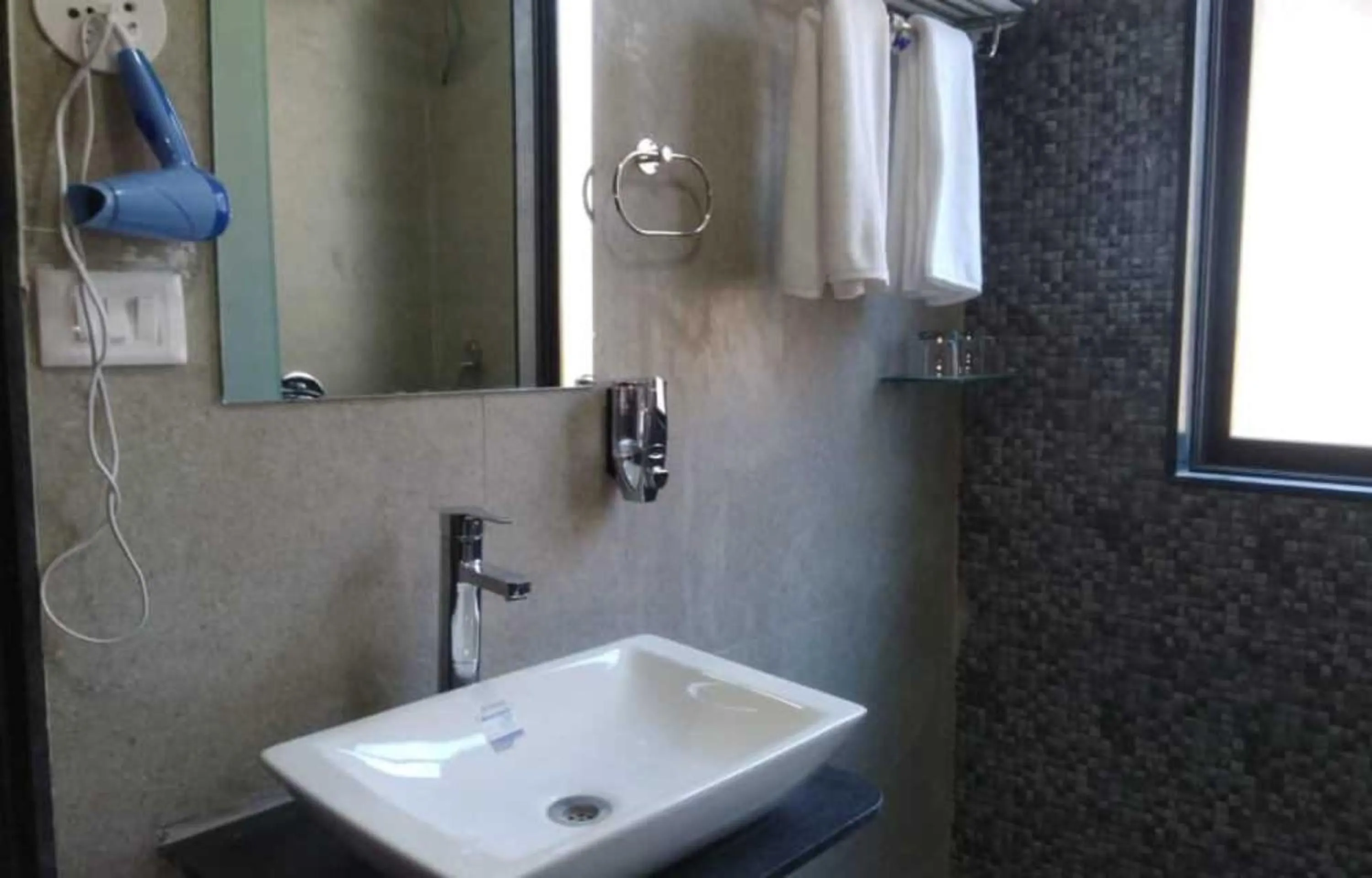 Bathroom in Palette by CheckIn The Royal Castle Resort Rajkot