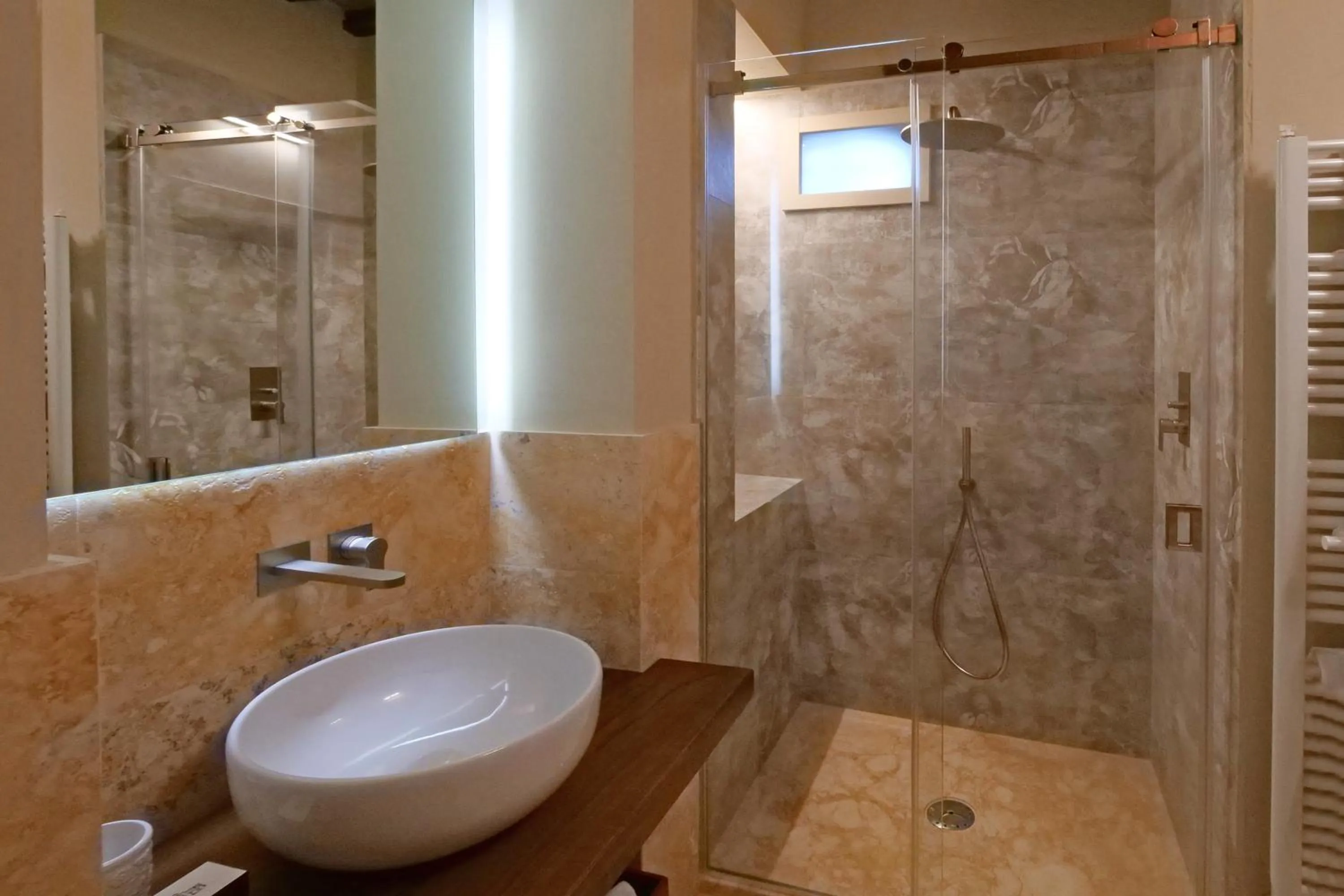 Shower in Delcorto Suites