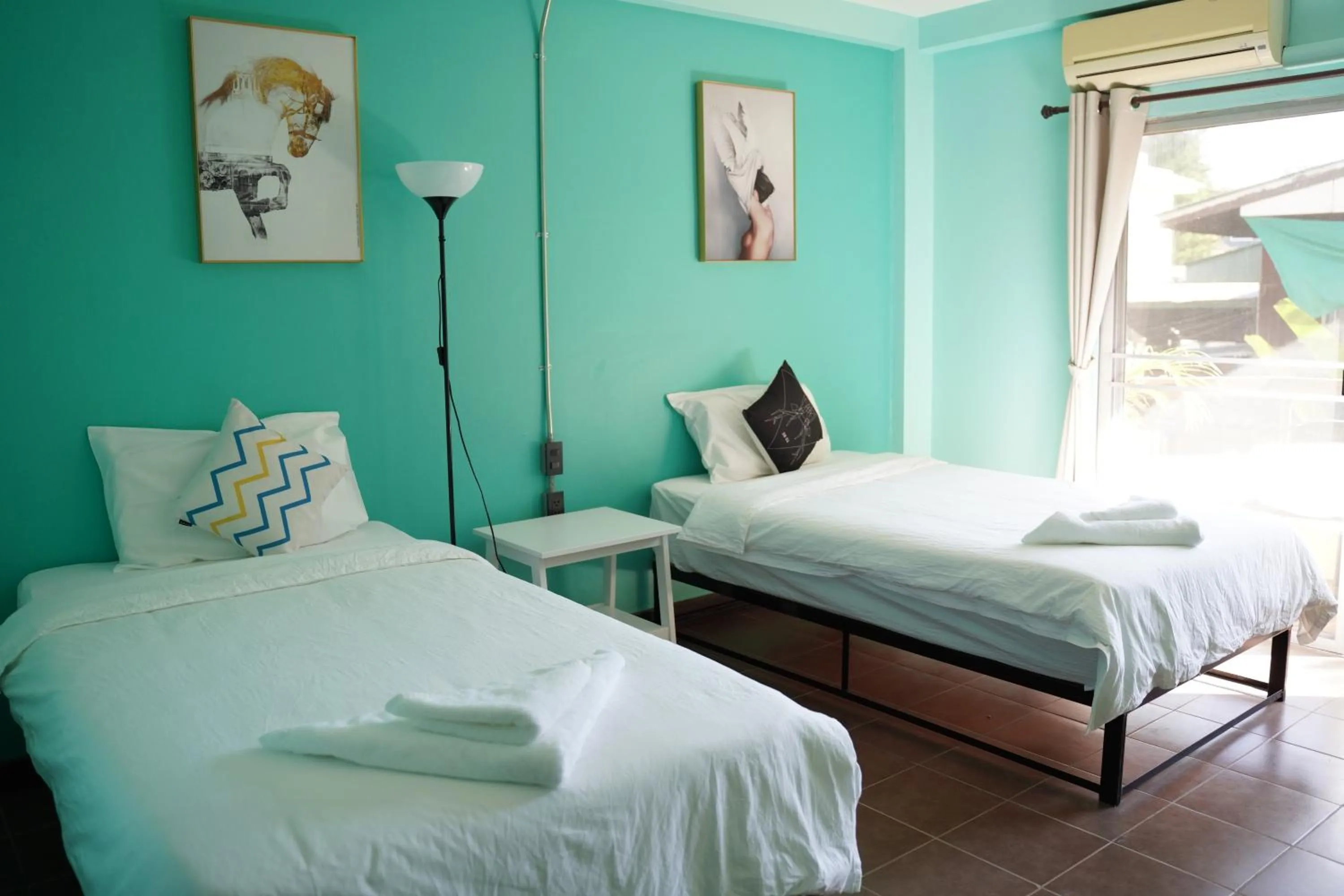 Bed in Elegant Lanna Guesthouse