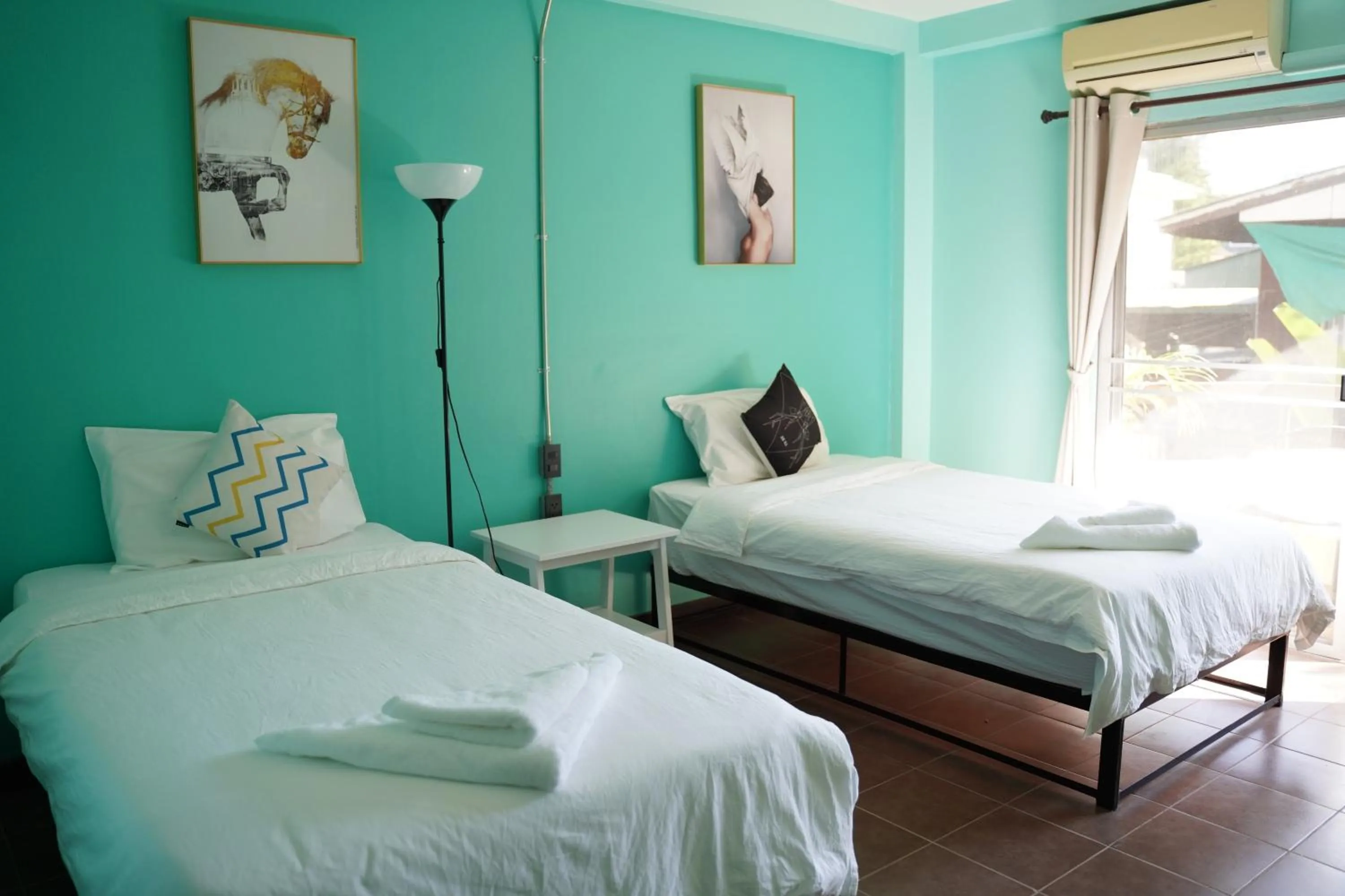 Bed in Elegant Lanna Guesthouse