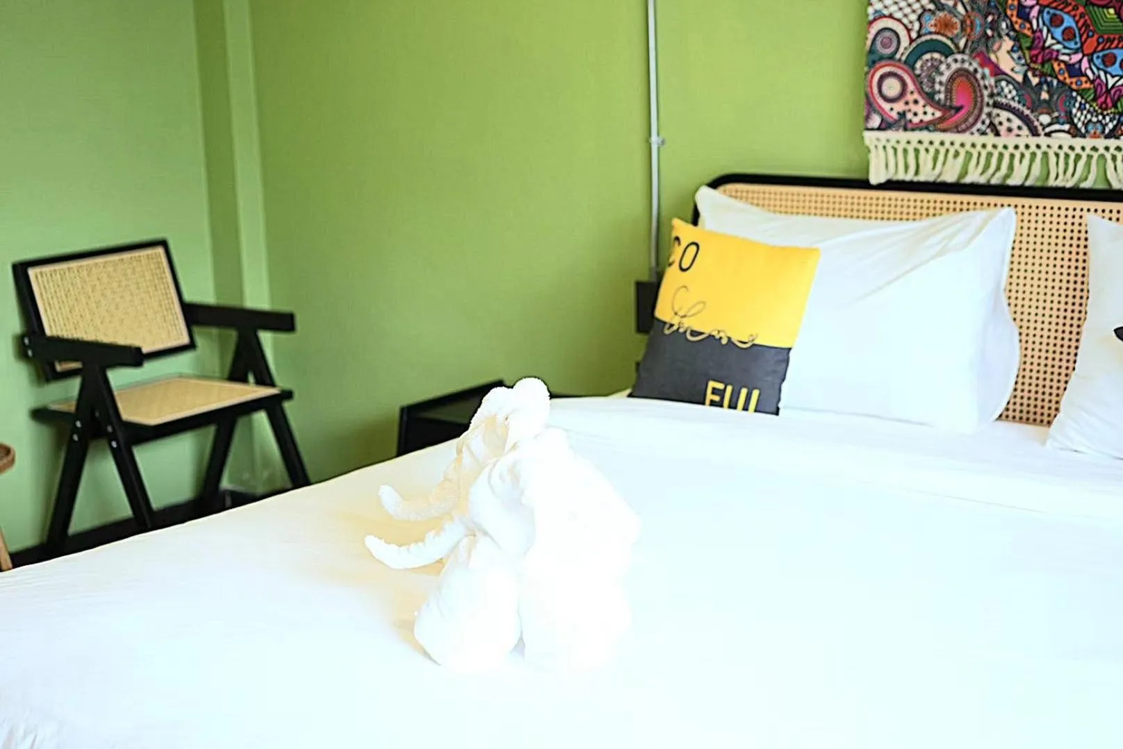 Bed in Elegant Lanna Guesthouse