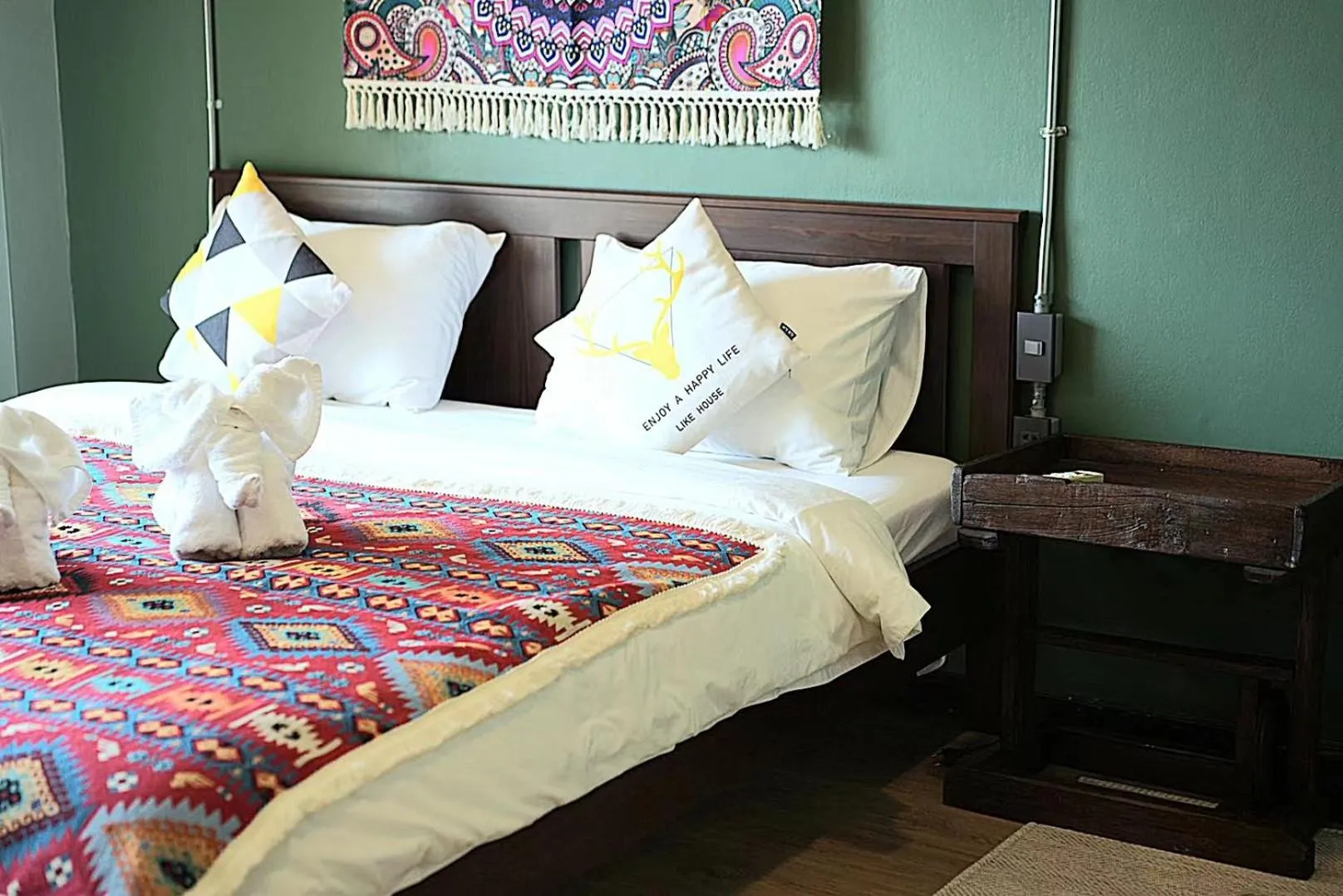 Bed in Elegant Lanna Guesthouse