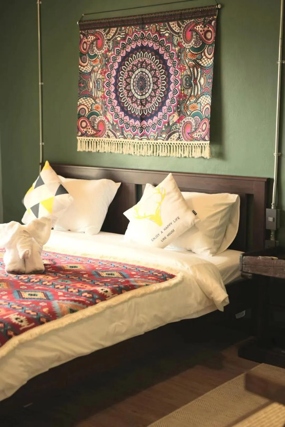 Bed in Elegant Lanna Guesthouse