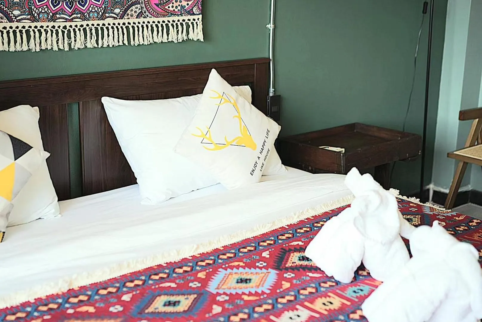 Bed in Elegant Lanna Guesthouse