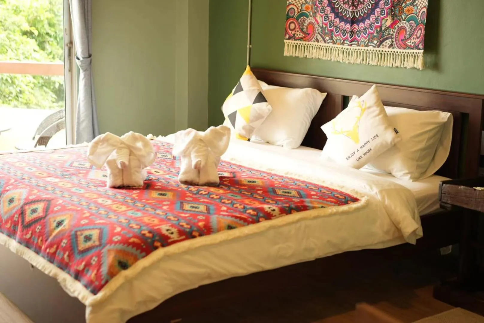 Bed in Elegant Lanna Guesthouse