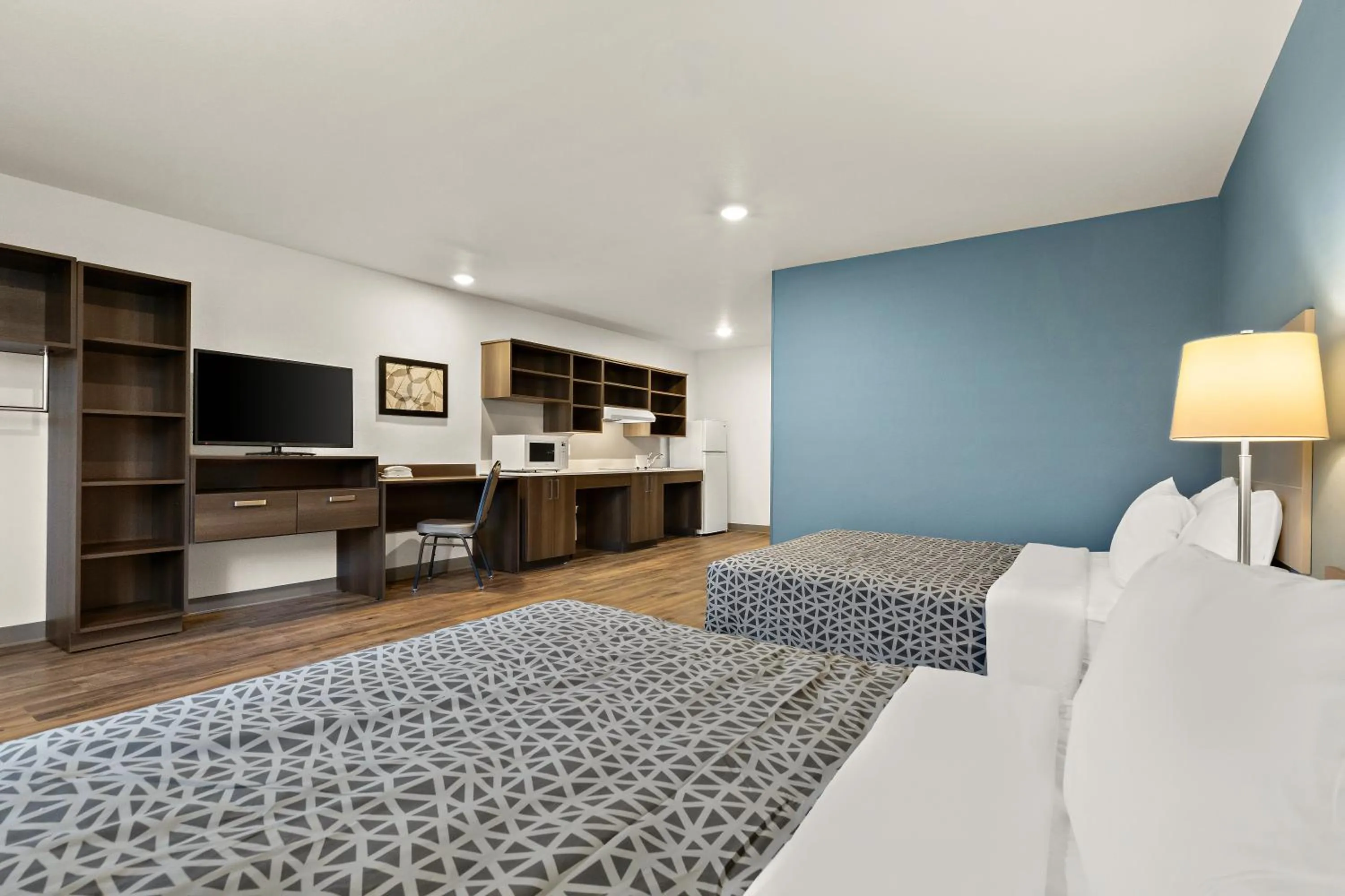 Bedroom in WoodSpring Suites Fort Collins