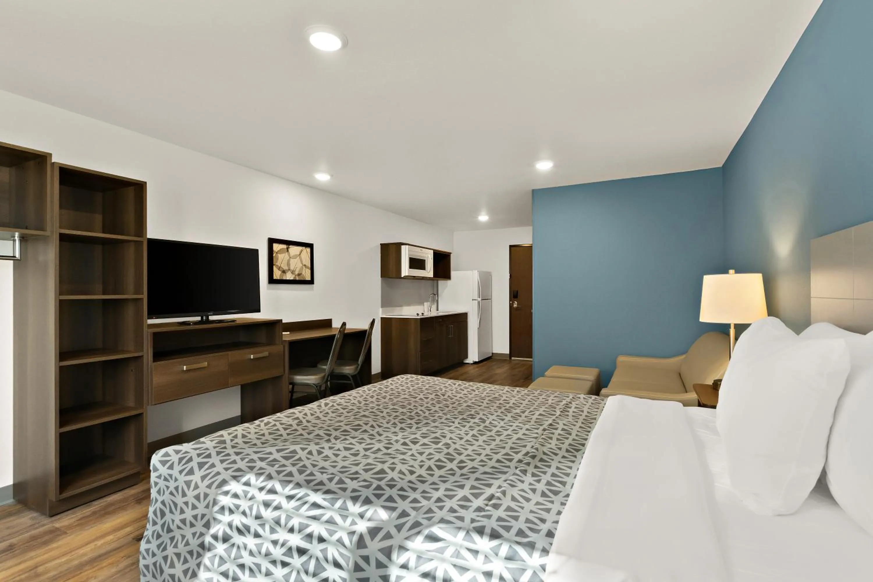 Bedroom in WoodSpring Suites Fort Collins
