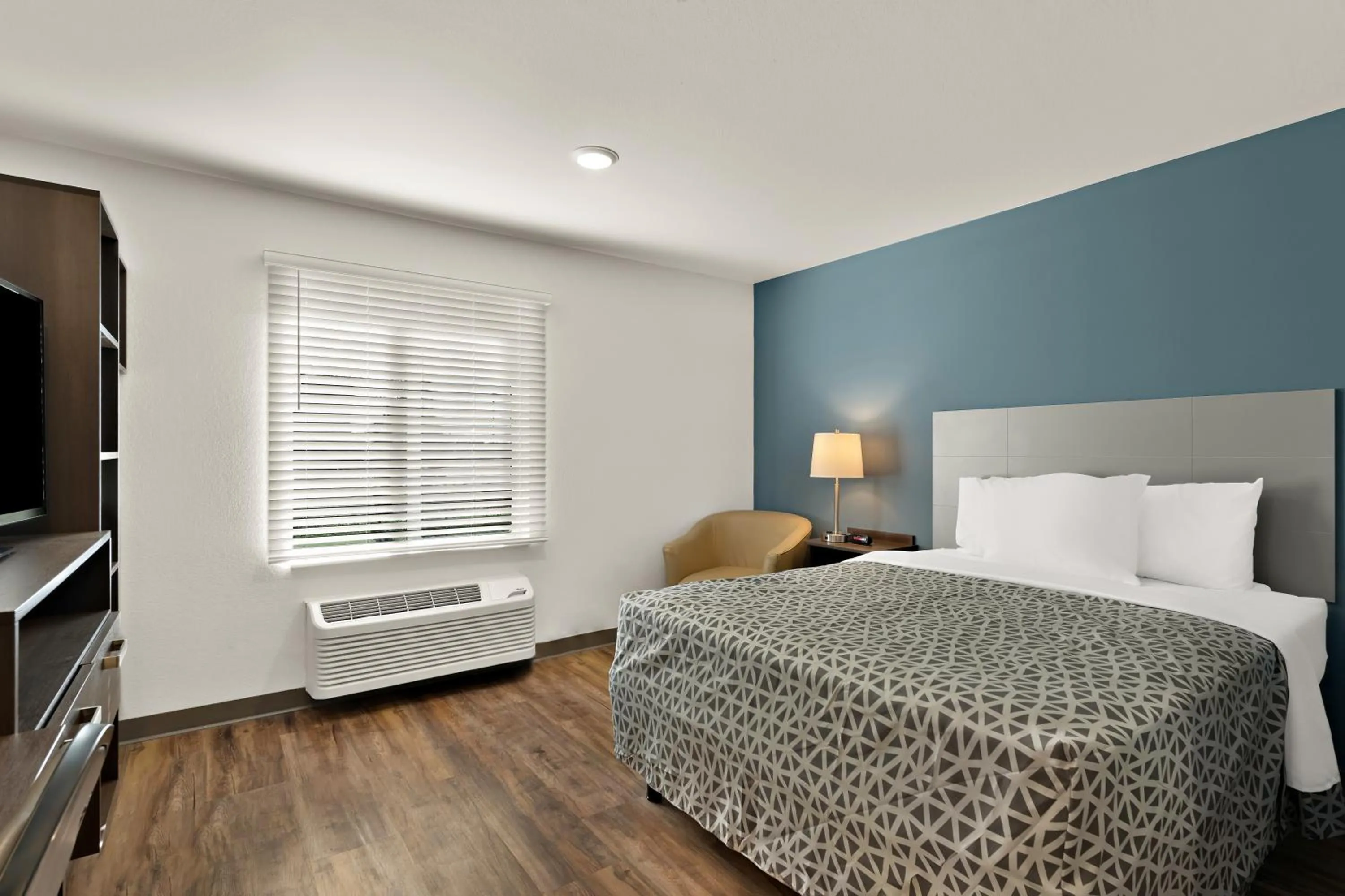 Bedroom in WoodSpring Suites Fort Collins