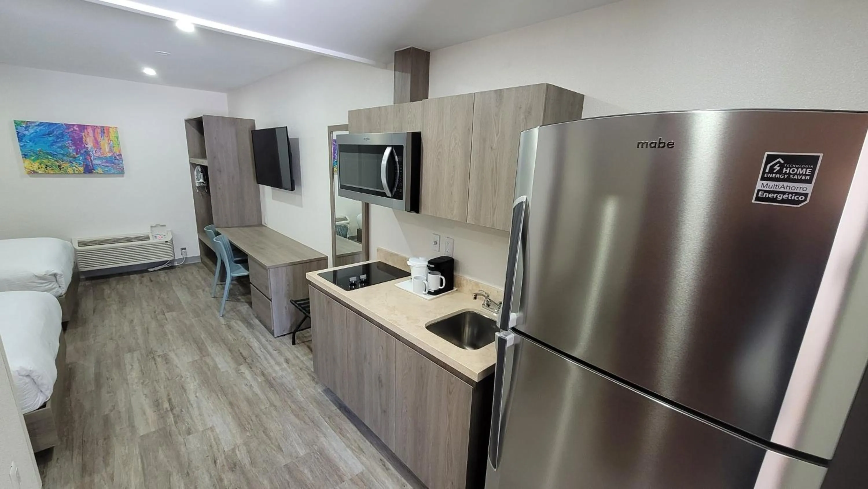 kitchen in Hotel Mesaluna Short & Long Stay