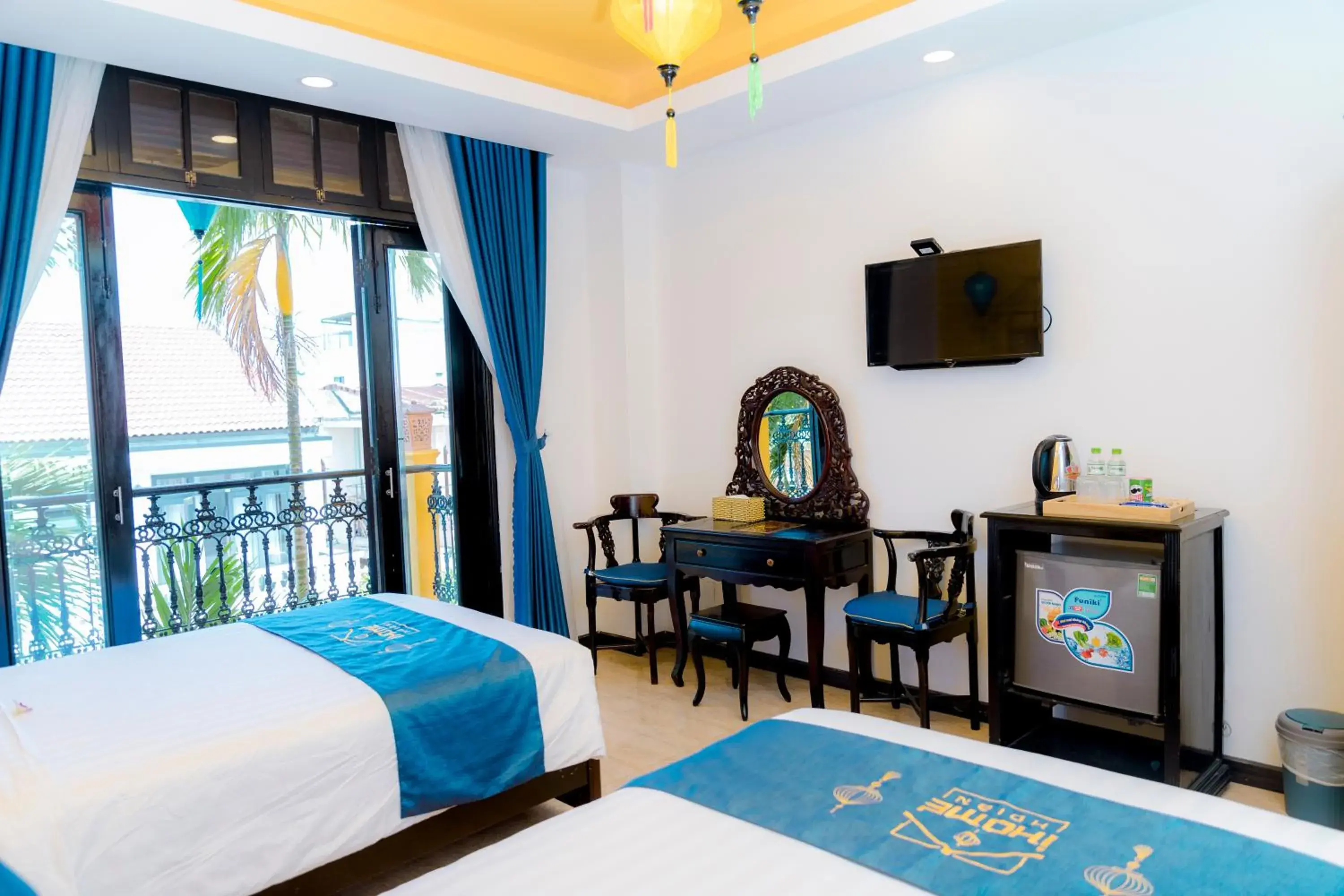 Triple Room with Balcony in iHome Hoi An Triple Room with Balcony in iHome Hoi An