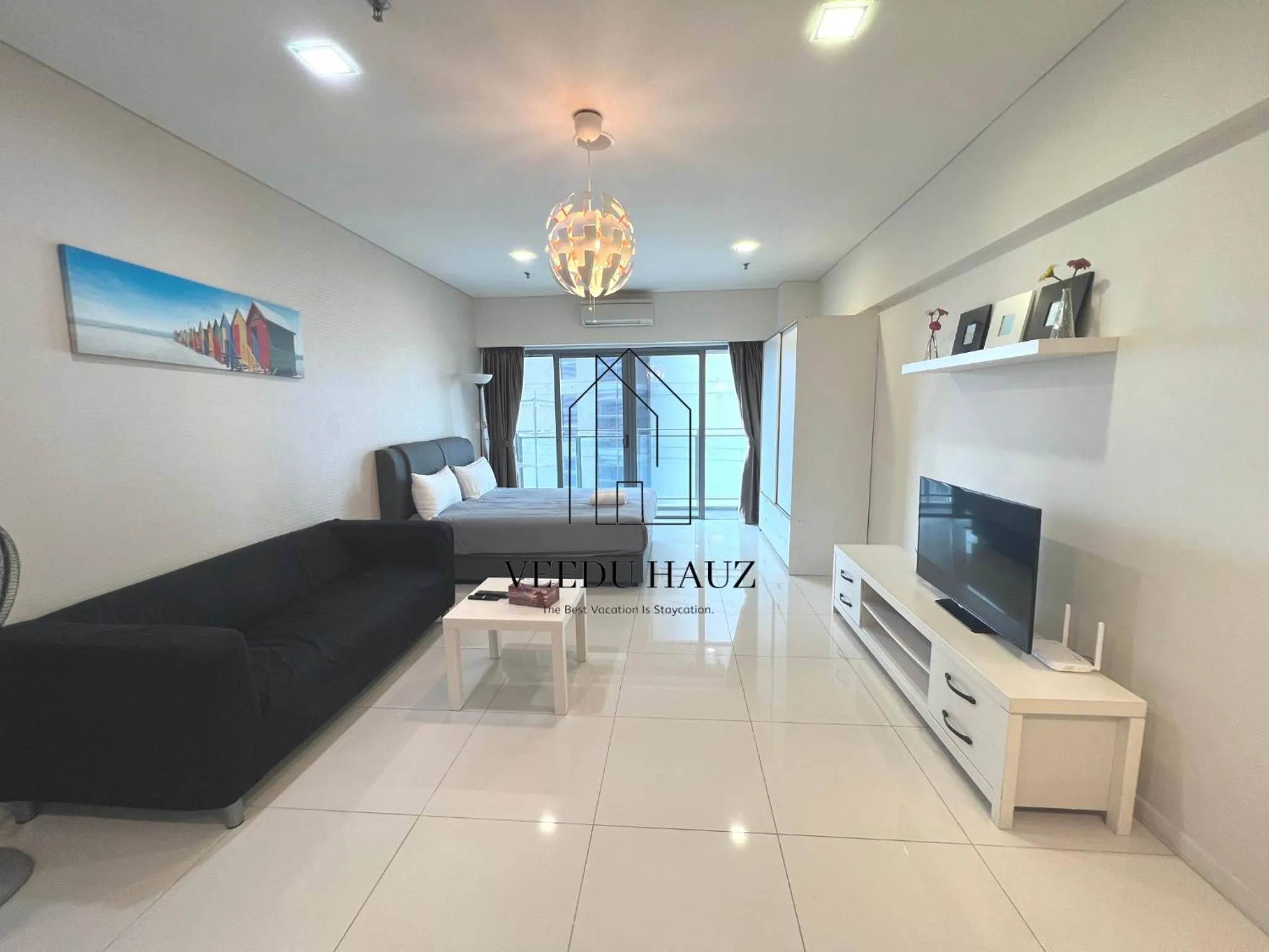 Communal lounge/ TV room in Mercu Summer Suites KLCC by Veedu Hauz