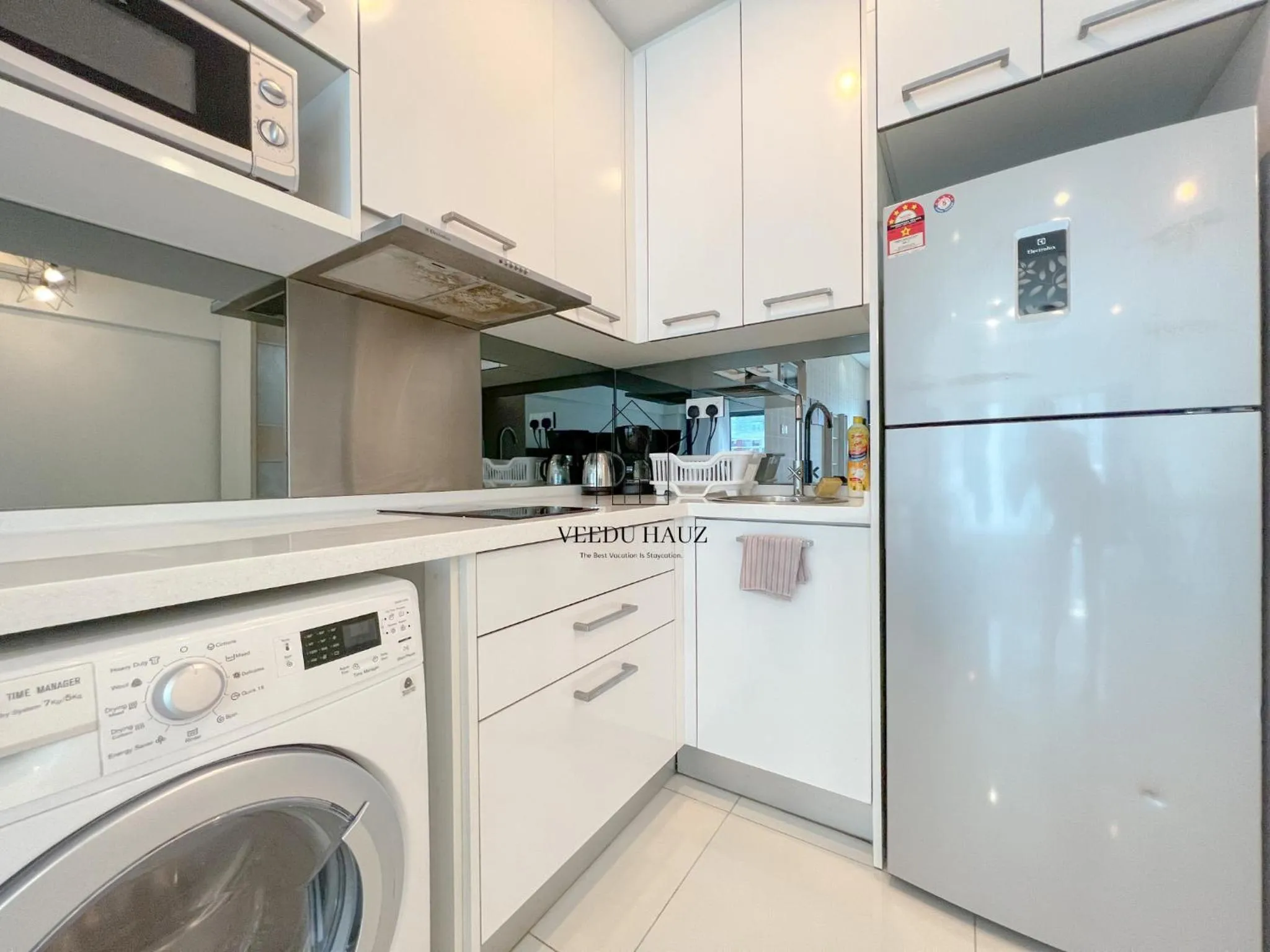 Kitchen or kitchenette in Mercu Summer Suites KLCC by Veedu Hauz