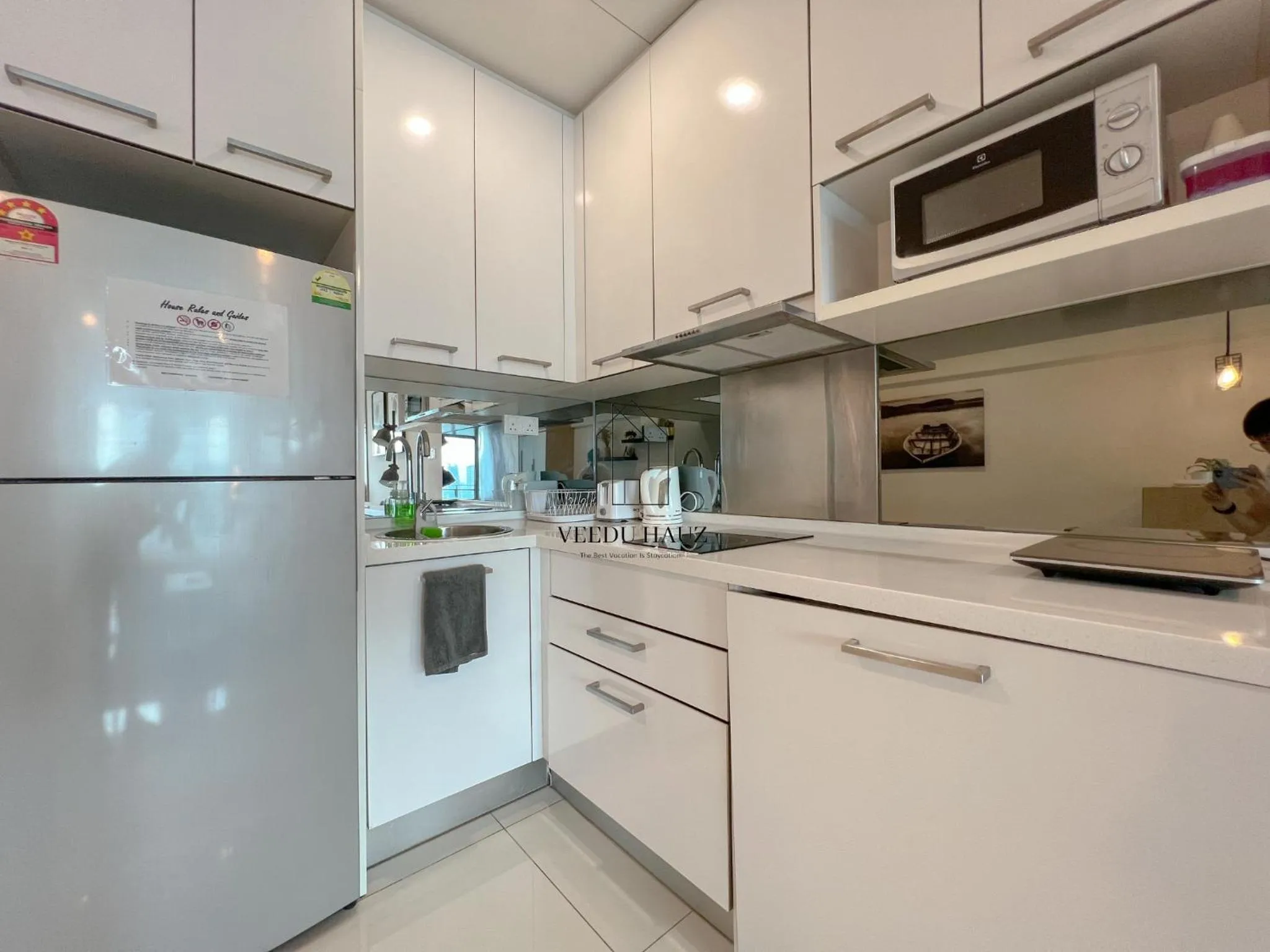 Kitchen or kitchenette in Mercu Summer Suites KLCC by Veedu Hauz
