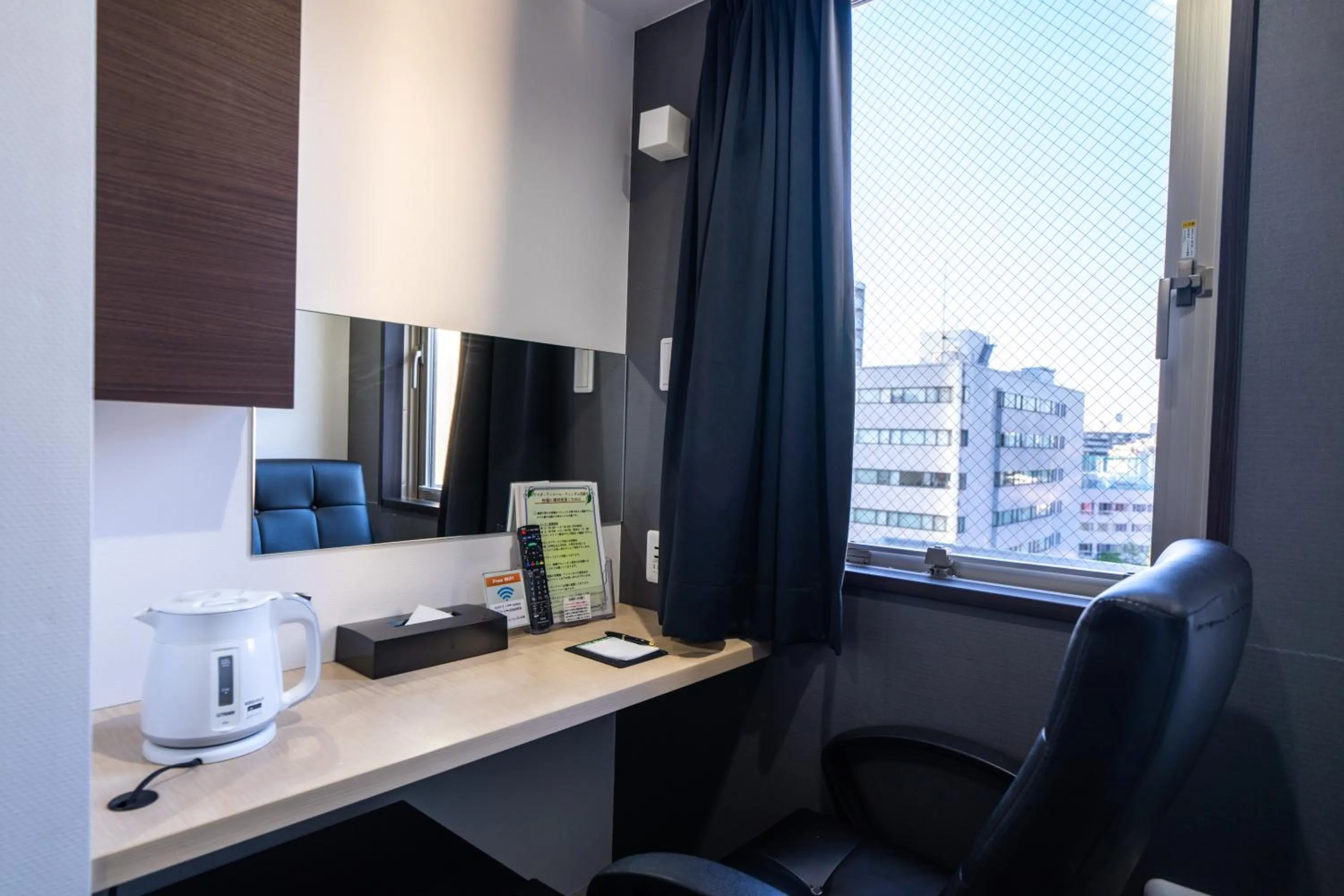 Photo of the whole room in Ramada Encore by Wyndham Amagasaki