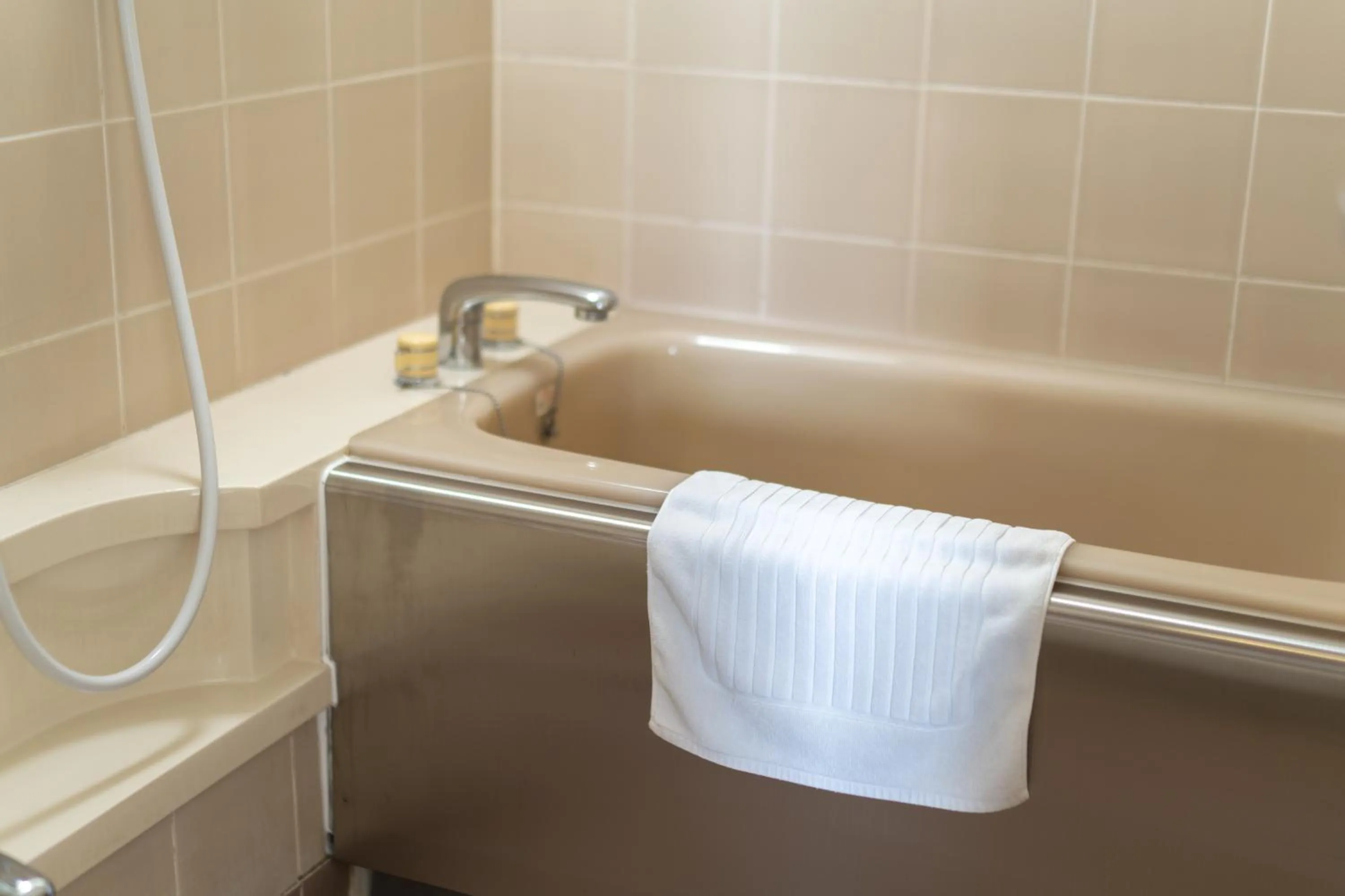 Shower in Ramada Encore by Wyndham Amagasaki