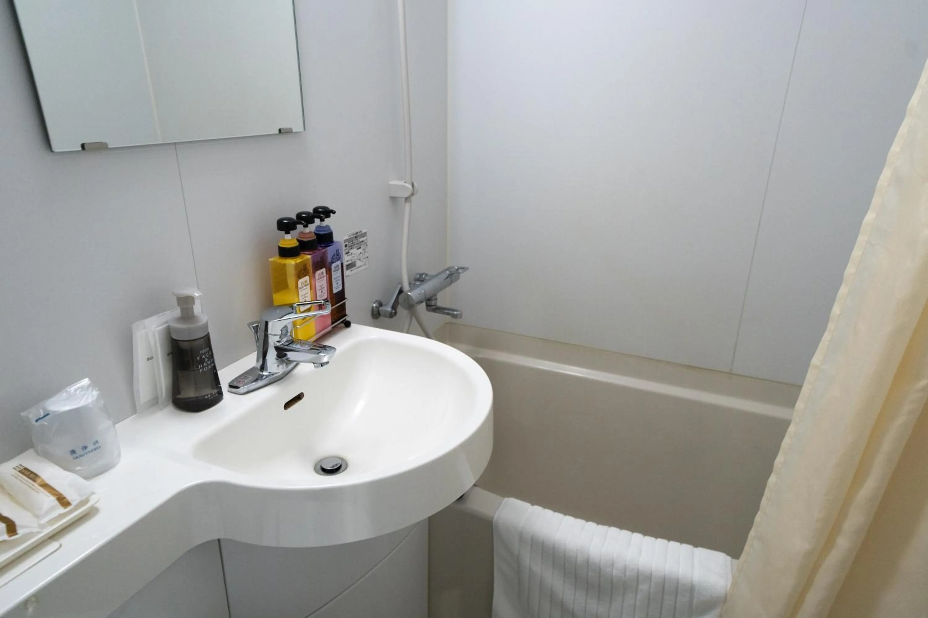 Shower in Ramada Encore by Wyndham Amagasaki