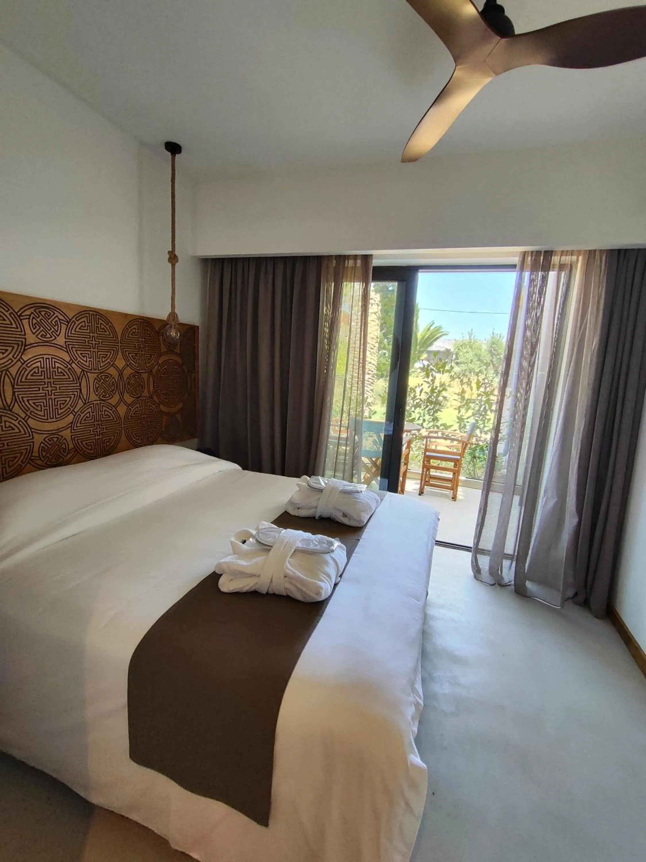 Bed in Helios Beach Hotel & Bungalows
