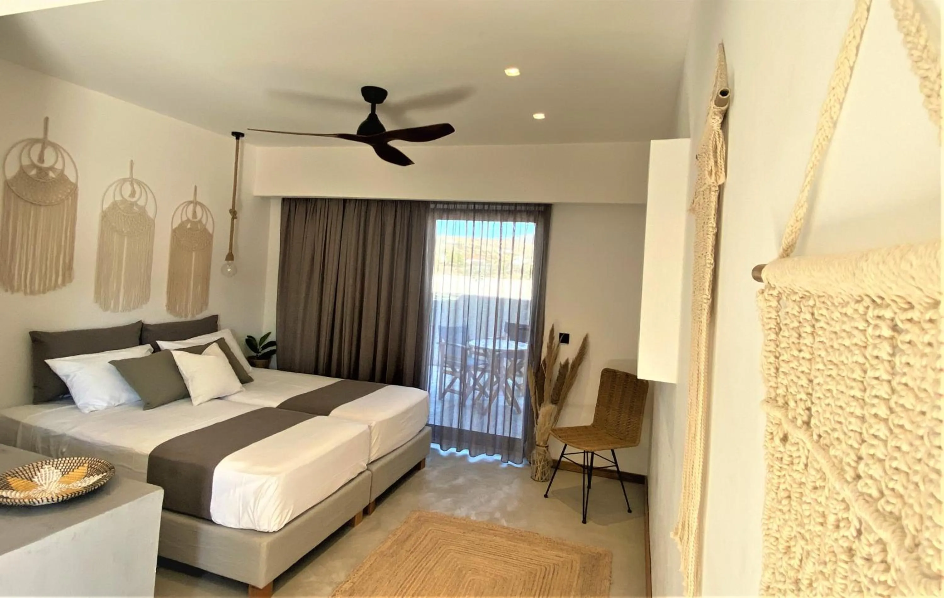 Bed in Helios Beach Hotel & Bungalows