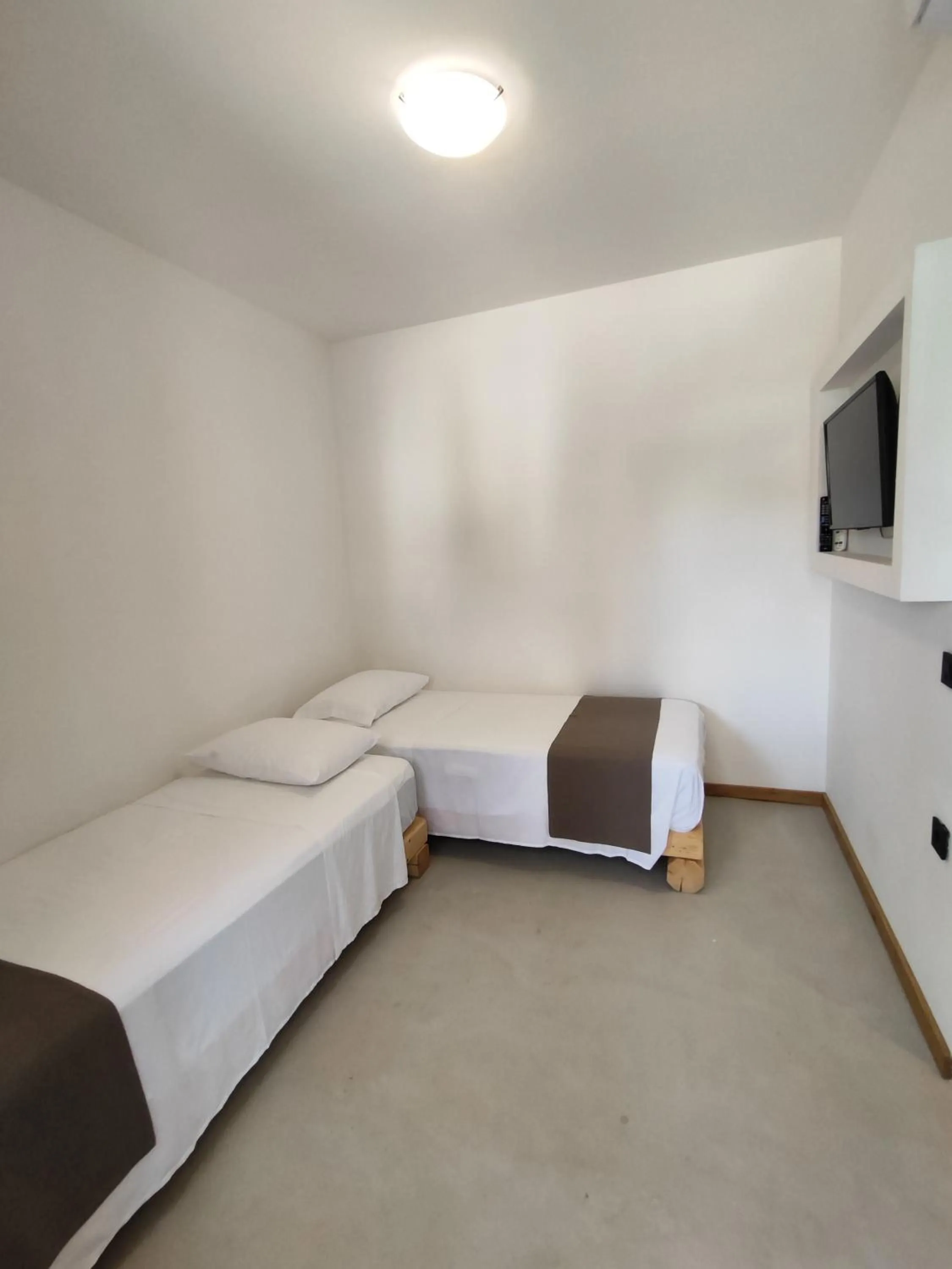 Bed in Helios Beach Hotel & Bungalows