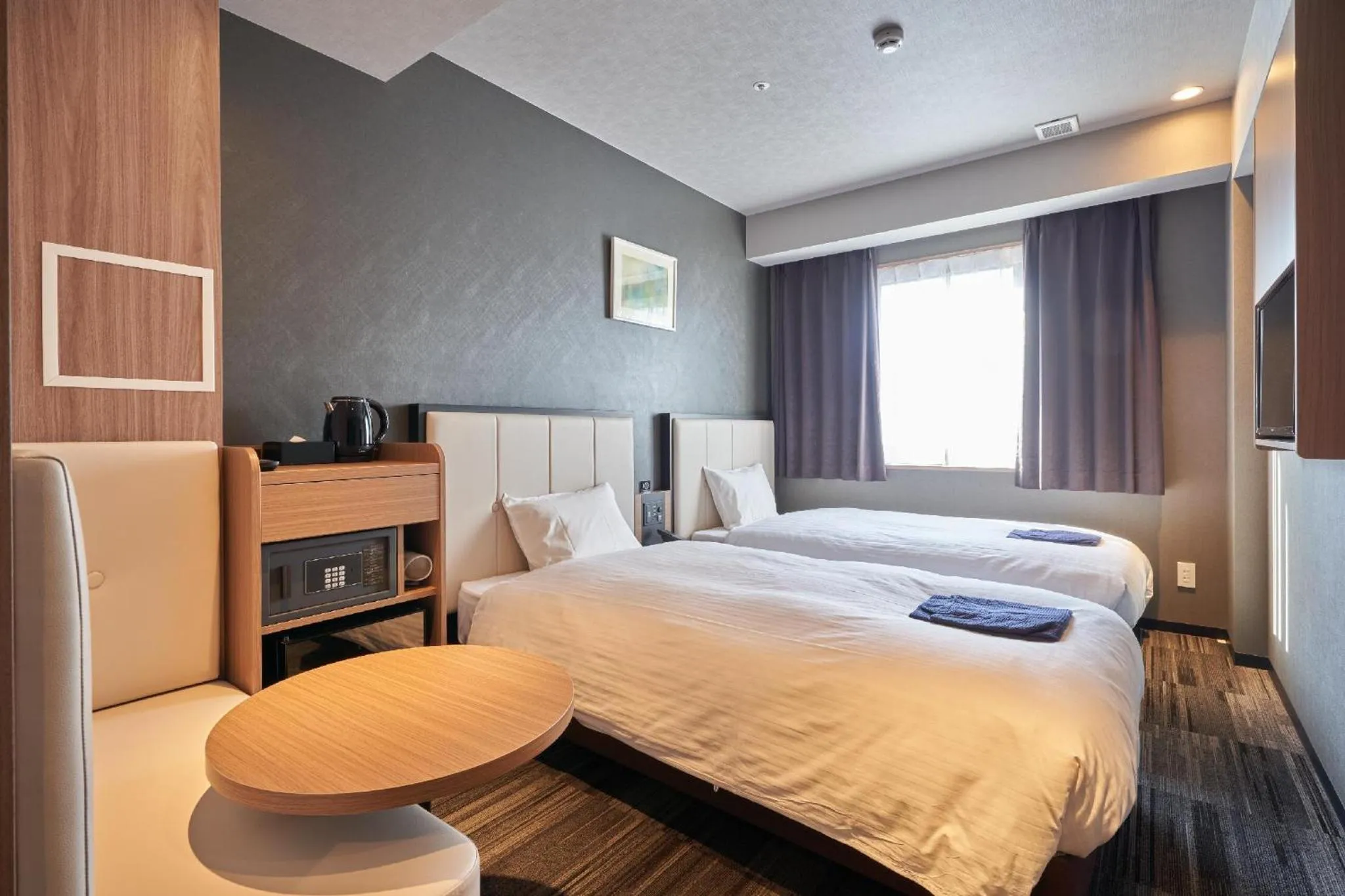 Photo of the whole room, Bed in Welina Hotel Premier Nakanoshima West