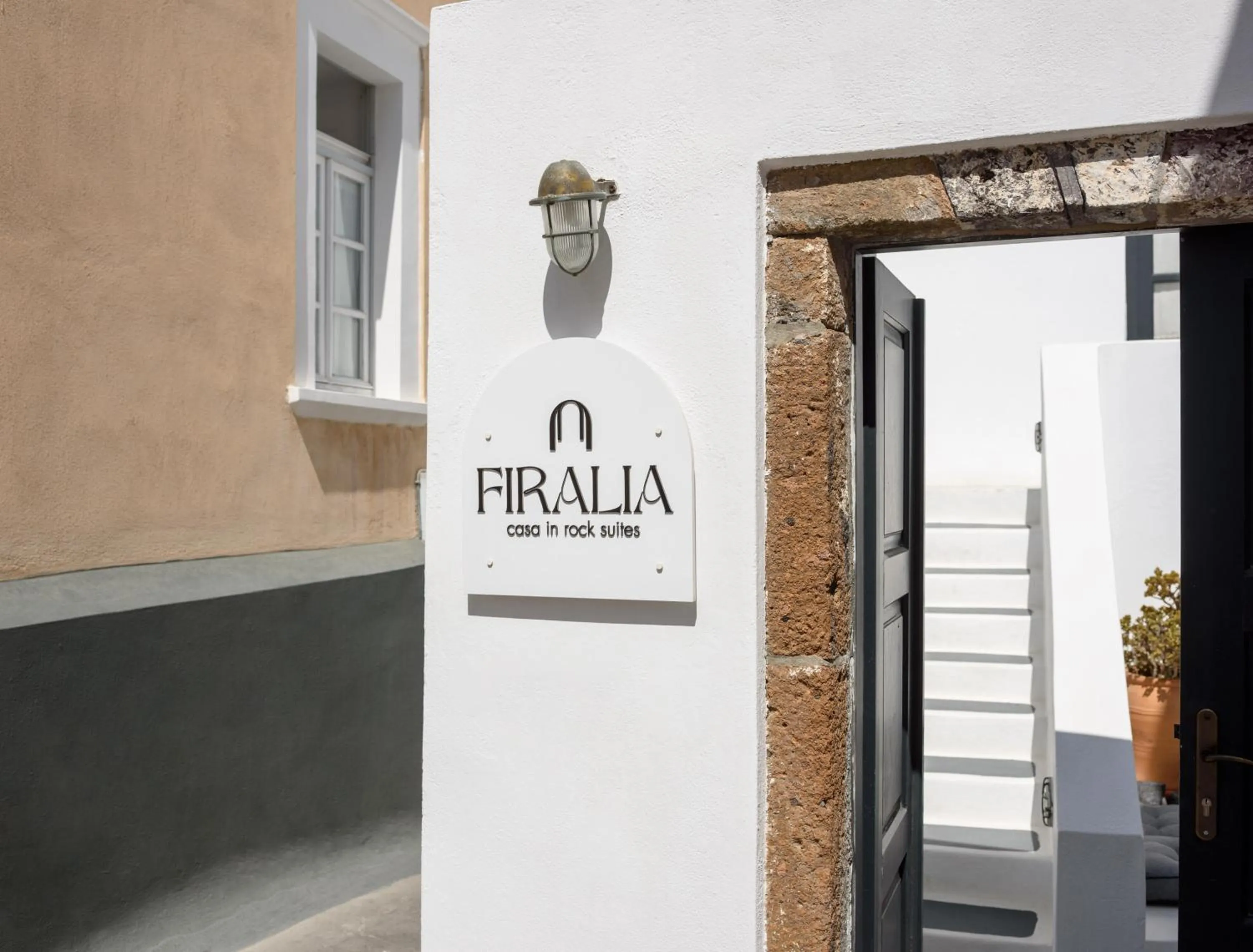 Property building in Firalia, Casa in Rock Suites
