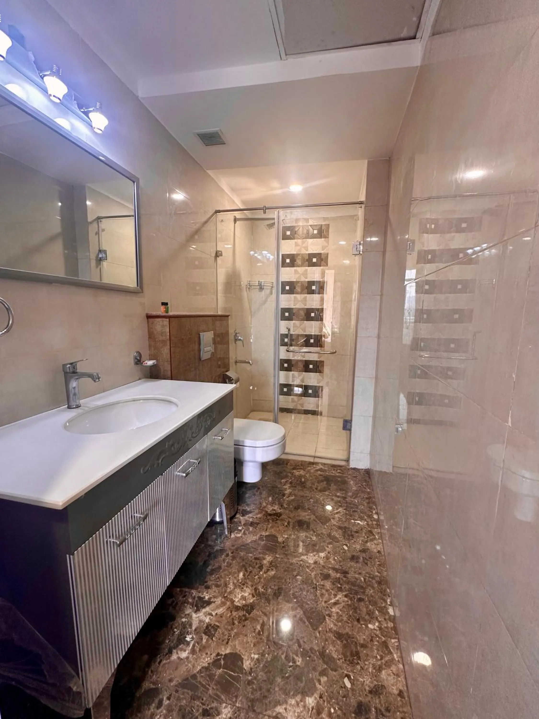 Shower in Flamingo Hotel Sector 67 I Studio Rooms I Gurgaon