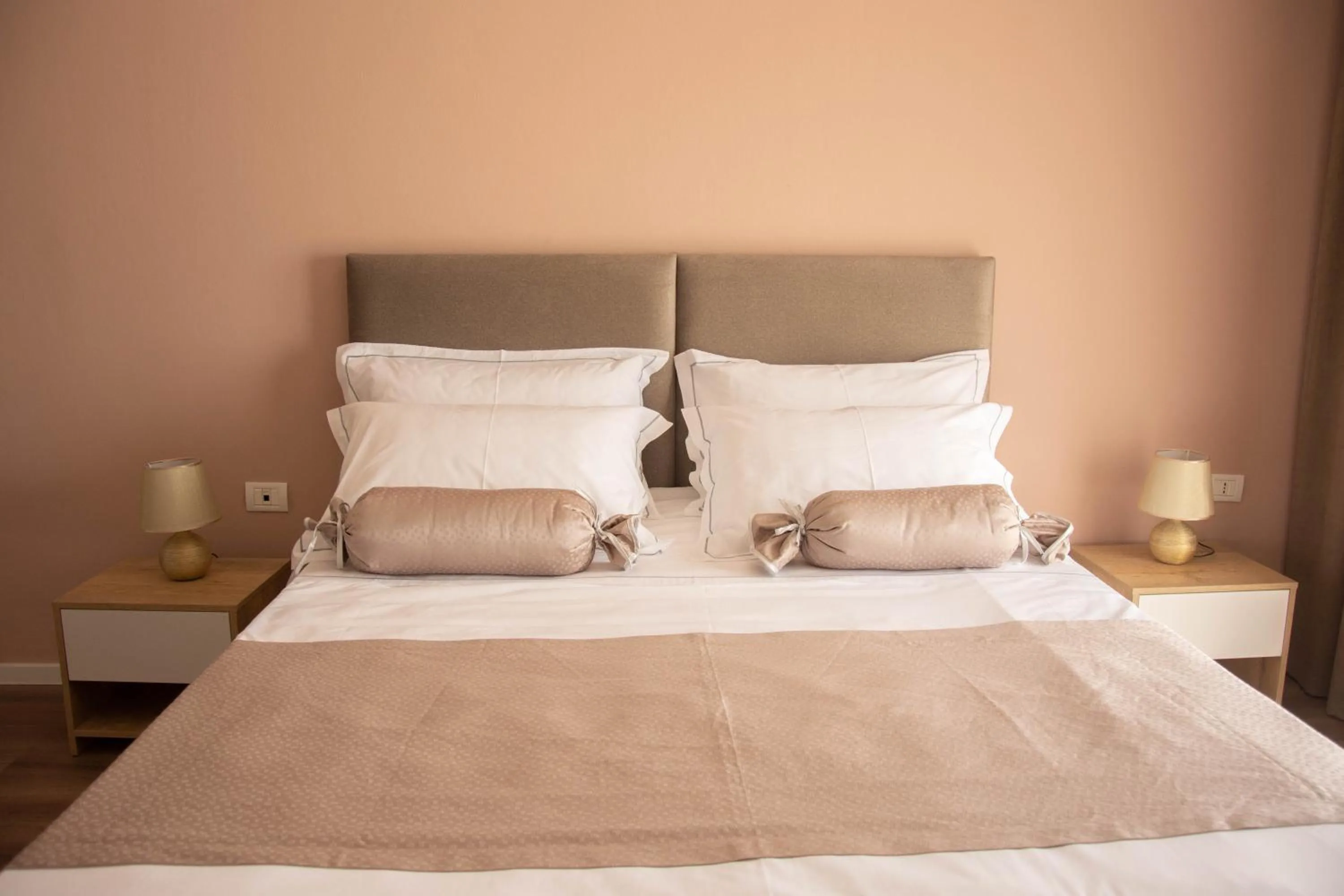 Bed in Wave Beachfront Apartments